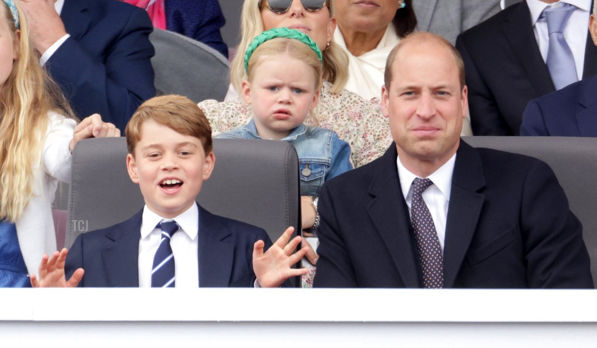 Prince George of Cambridge and Prince William, Duke of Cambridge watch the Platinum Pageant on June 05, 2022 in London, England