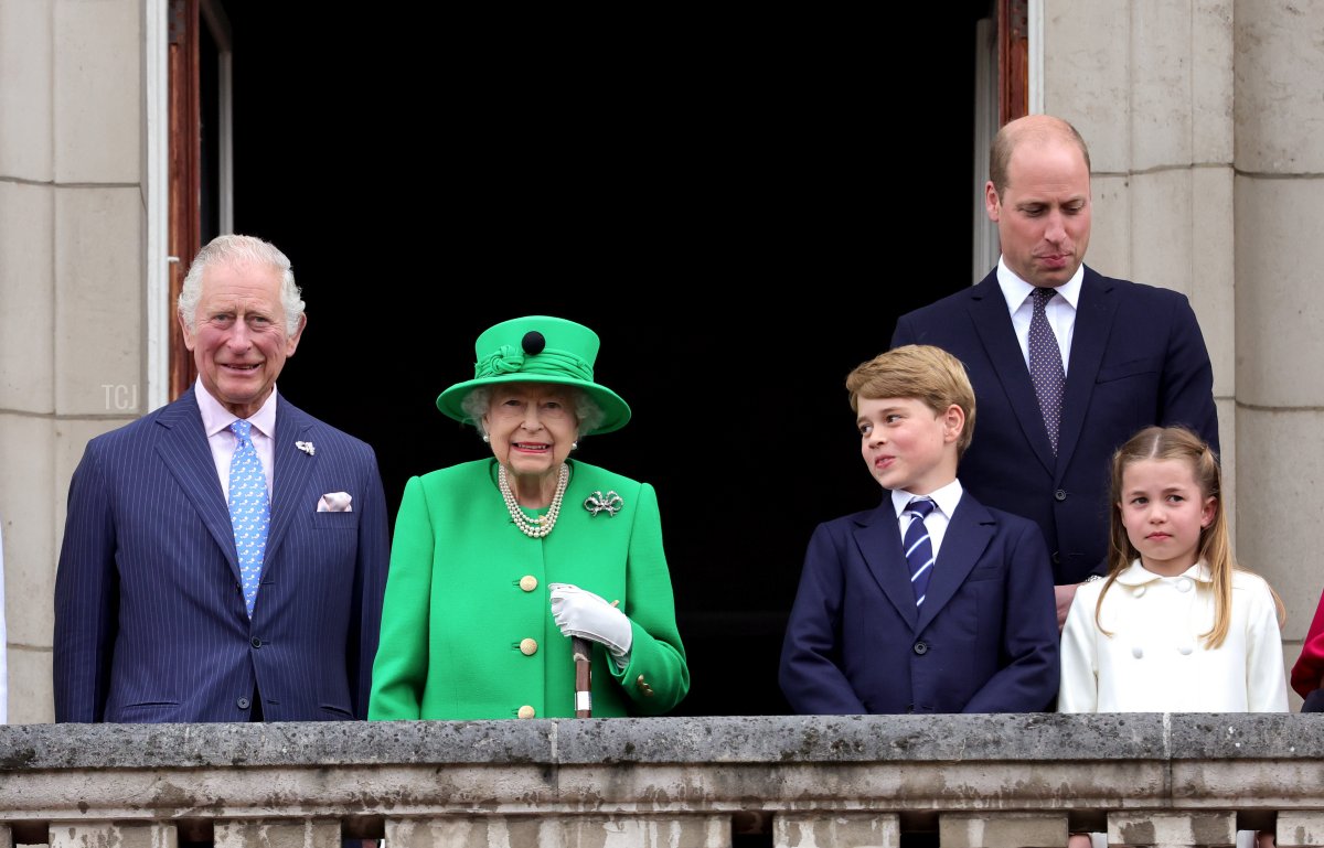 Prince Charles, Prince of Wales, Queen Elizabeth II, Prince George of Cambridge, Prince William, Duke of Cambridge and Princess Charlotte of Cambridge stand on the balcony during the Platinum Pageant on June 05, 2022 in London, England