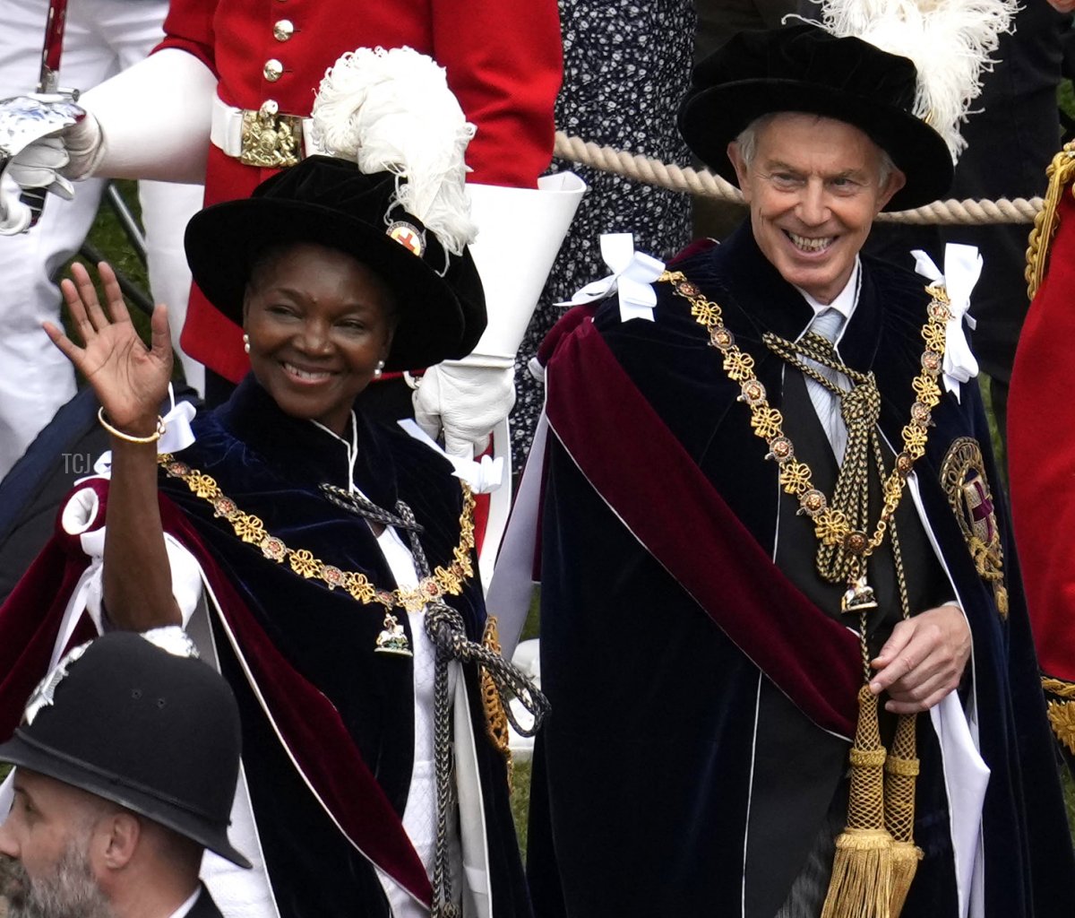 Britain's former Prime Minister Tony Blair (R) and Former leader of the British House of Lords Baroness Amos arrive at St George's Chapel to attend the Most Noble Order of the Garter Ceremony in Windsor Castle in Windsor, west of London on June 13, 2022