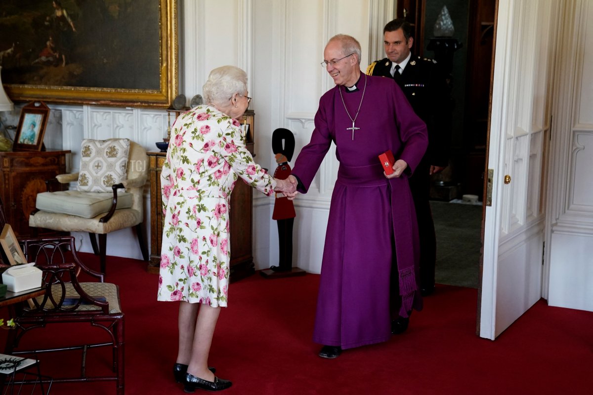 Queen Elizabeth II receives the Archbishop of Canterbury Justin Welby at Windsor Castle, where he presented her with a special 'Canterbury Cross' for her 'unstinting' service to the Church of England over seventy years and a citation for the Cross, which was presented as a framed piece of calligraphy on June 21, 2022 in Windsor, England