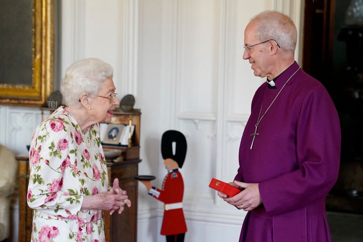 Queen Elizabeth II receives the Archbishop of Canterbury Justin Welby at Windsor Castle, where he presented her with a special 'Canterbury Cross' for her 'unstinting' service to the Church of England over seventy years and a citation for the Cross, which was presented as a framed piece of calligraphy on June 21, 2022 in Windsor, England