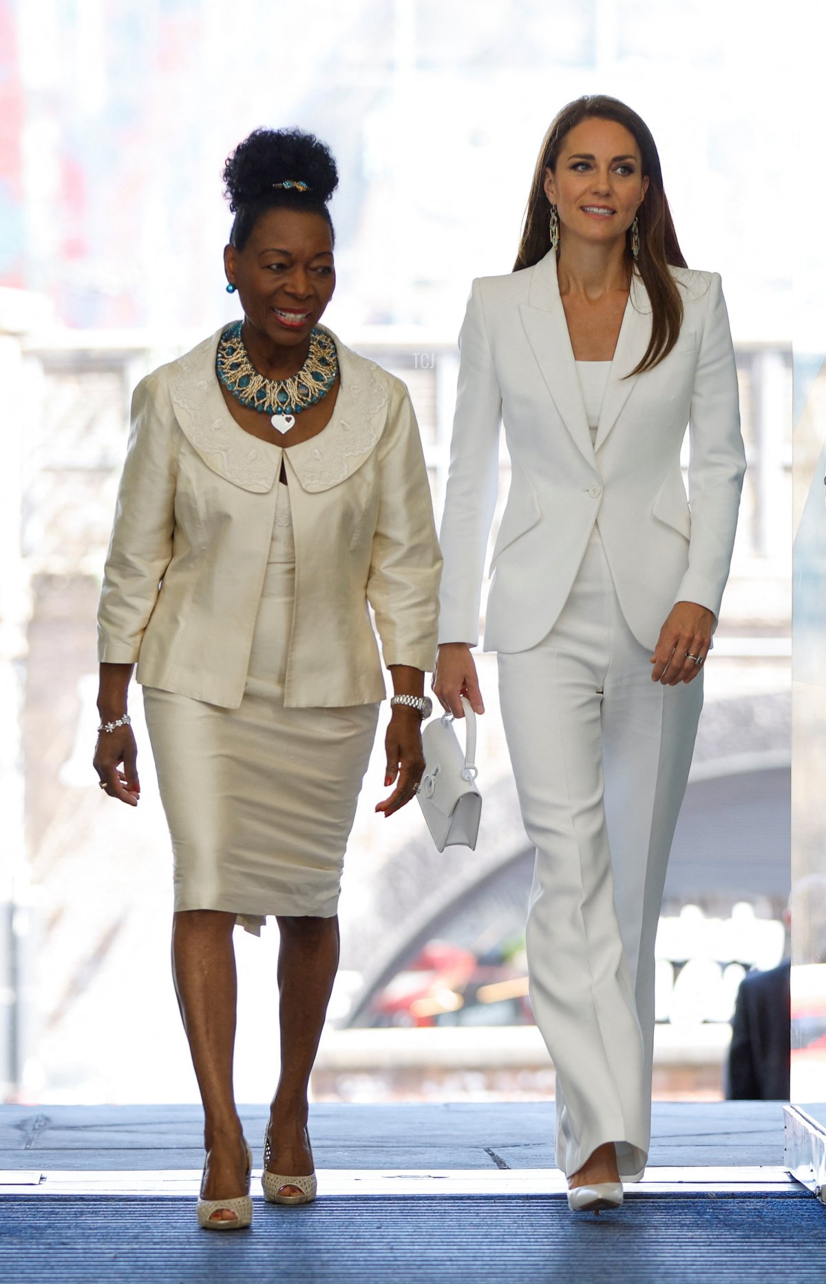 Prince William, Duke of Cambridge and Catherine, Duchess of Cambridge accompanied by Baroness Floella Benjamin attend the unveiling of the National Windrush Monument at Waterloo Station on June 22, 2022 in London, England