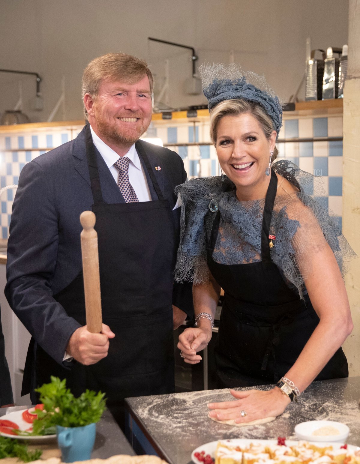 King Willem-Alexander of the Netherlands and Queen Maxima of the Netherlands visit the "Community Cooking" project of Caritas in the Brotfabrik Vienna, Austria on June 28, 2022