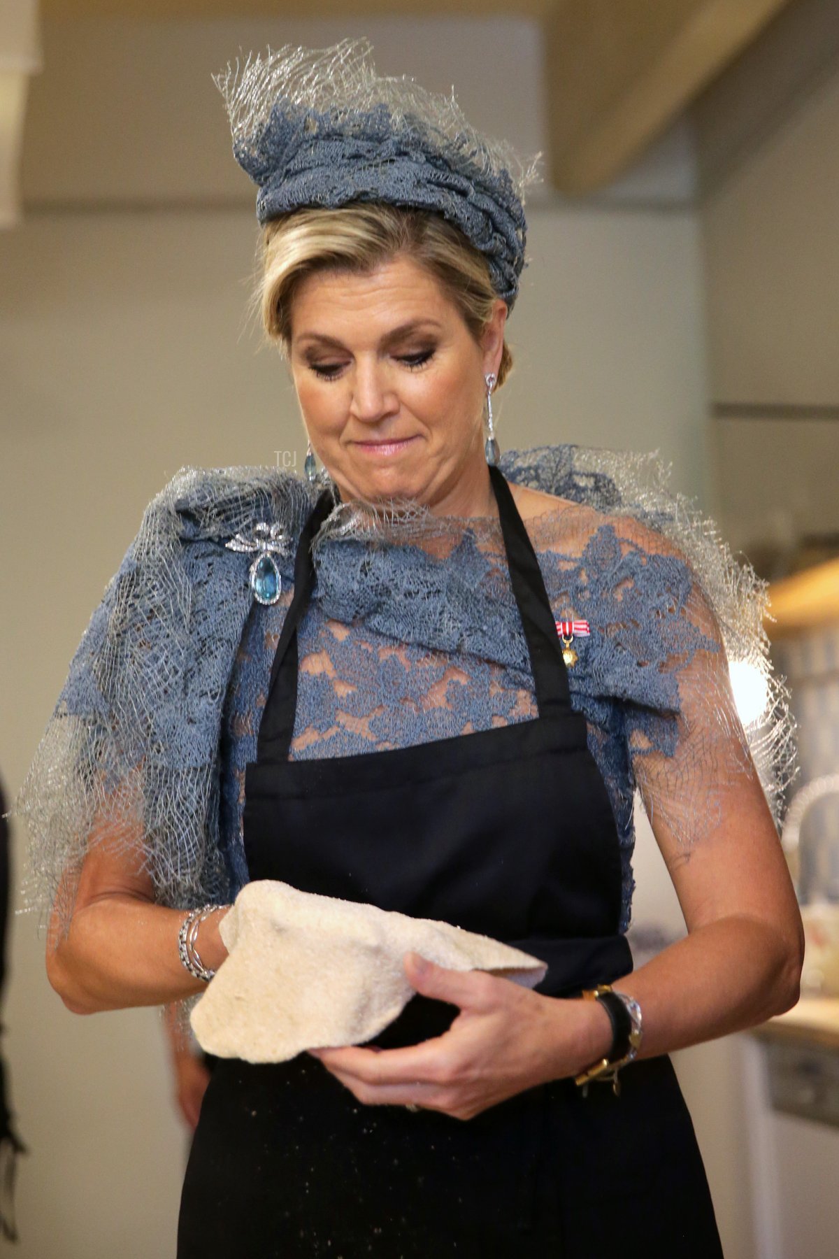Queen Maxima of The Netherlands cooks during a visit of the community cooking project at Brotfabrik on June 28, 2022 in Vienna, Austria