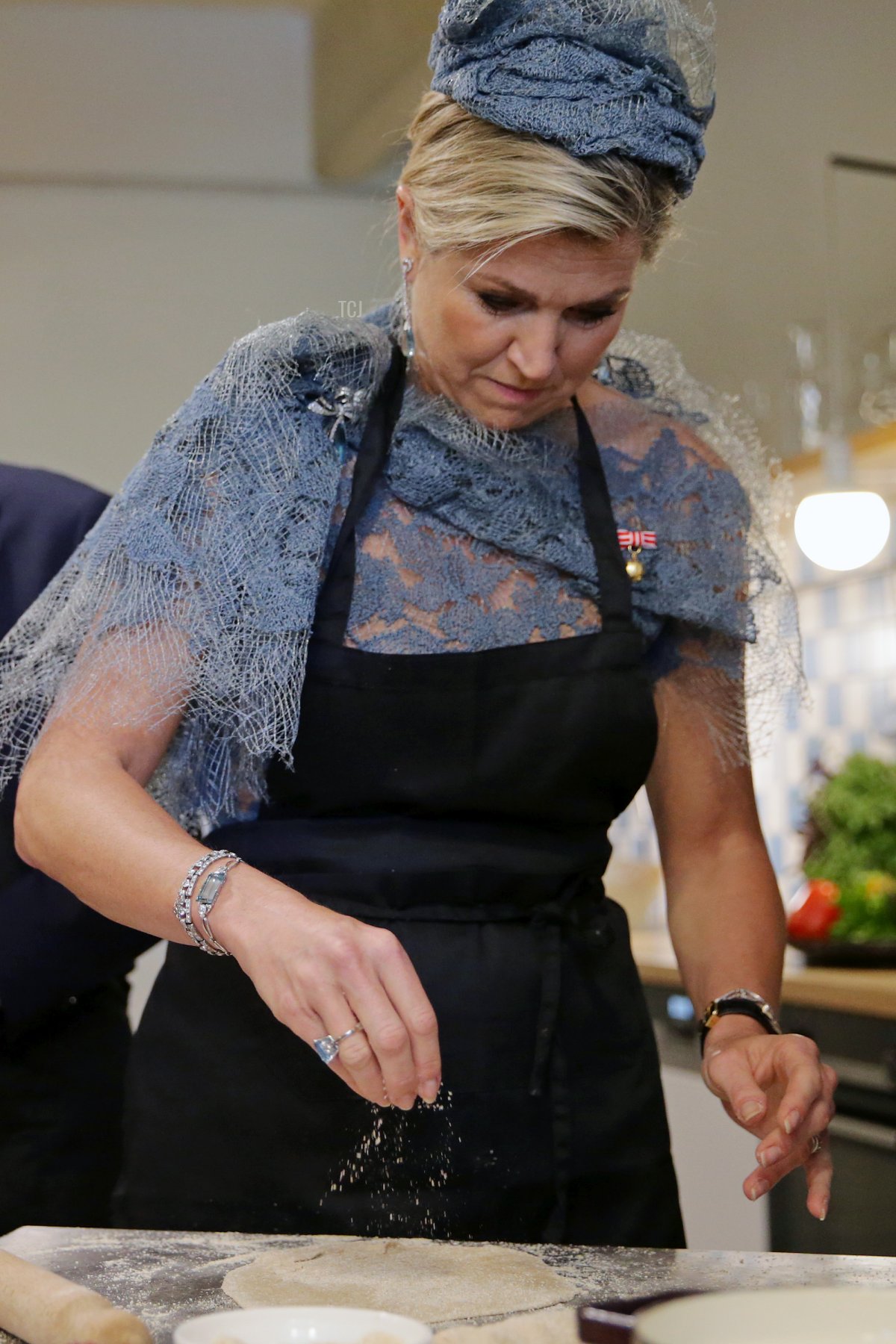 Queen Maxima of The Netherlands cooks during a visit of the community cooking project at Brotfabrik on June 28, 2022 in Vienna, Austria