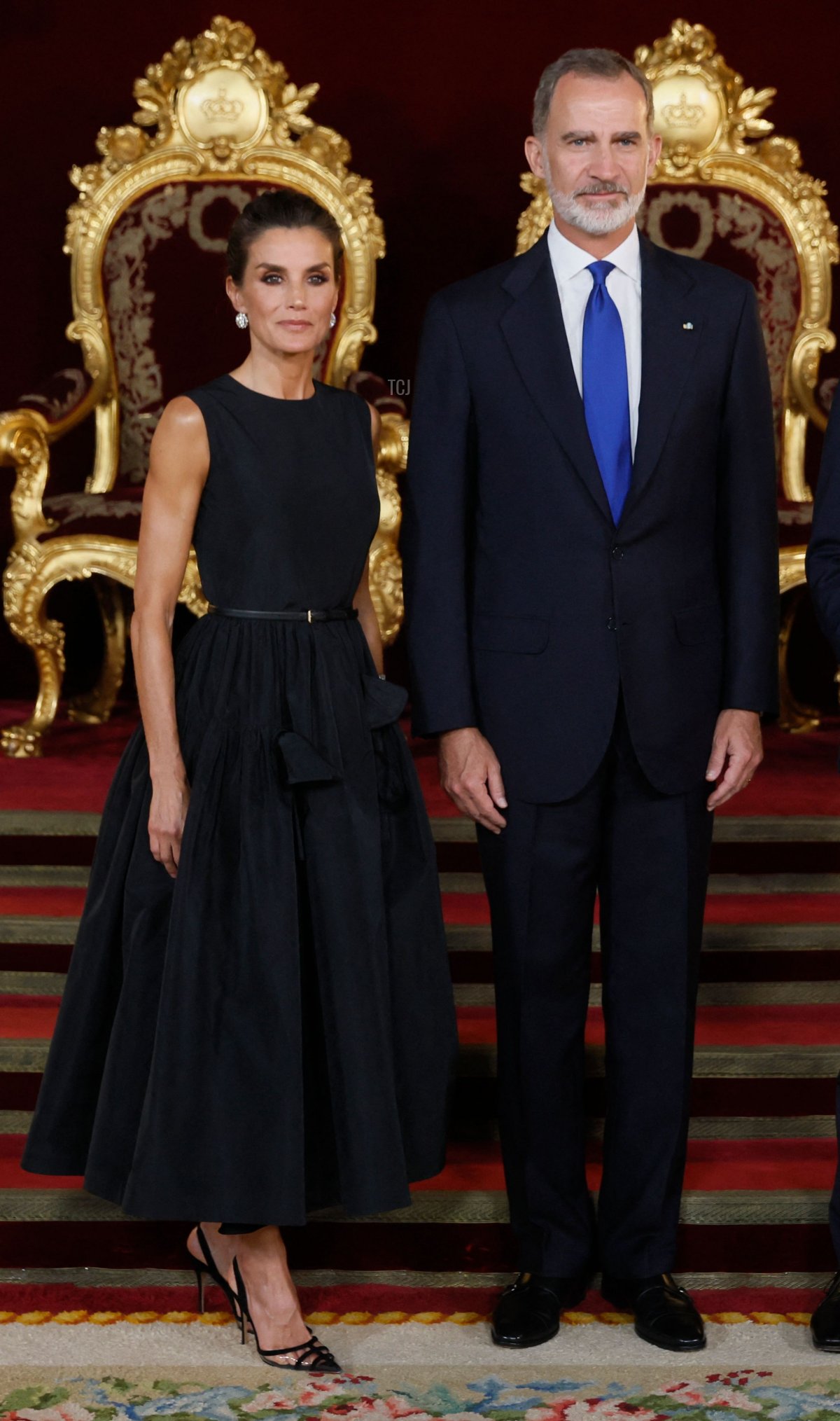 Spain's Queen Letizia, Spain's King Felipe VI and Canada's Prime Minister Justin Trudeau pose for pictures before their meeting during the NATO summit, at the Palacio Real in Madrid, on June 28, 2022