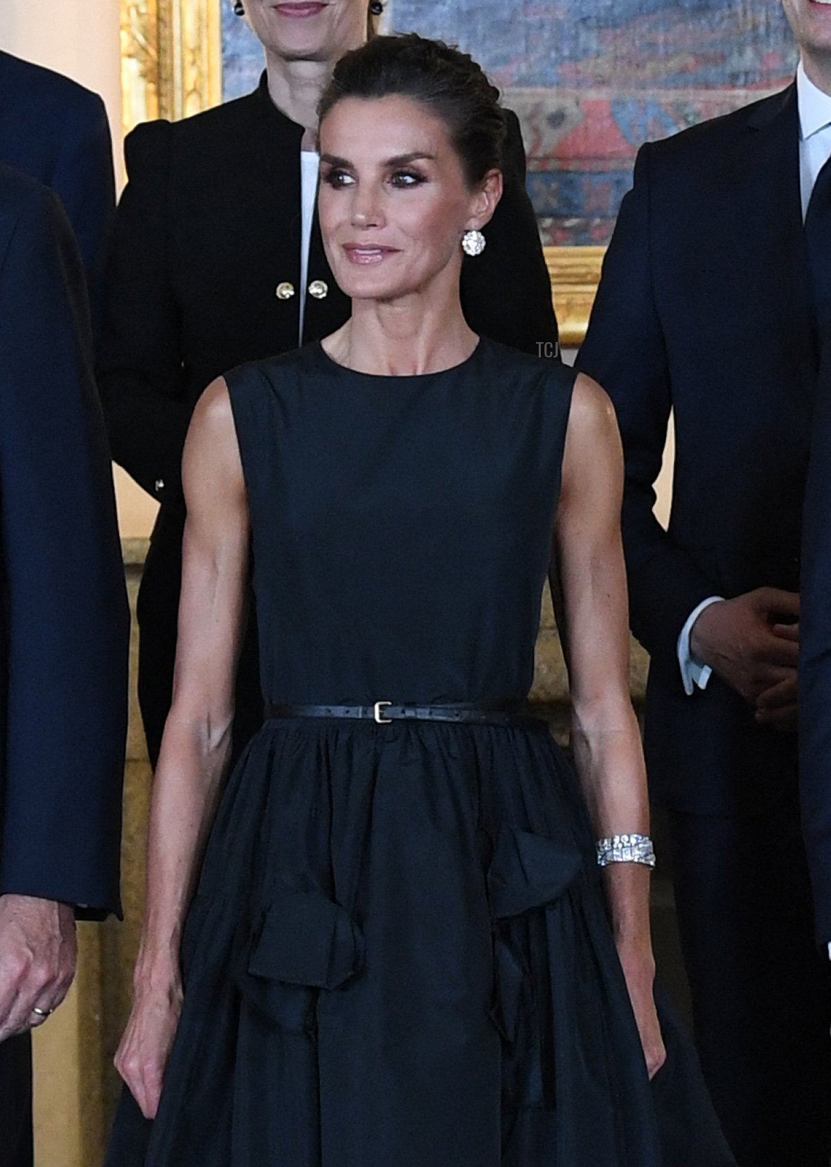 Spain's Prime Minister Pedro Sanchez (R), Spain's King Felipe VI (2ndL) and Spain's Queen Letizia pose during a family picture before a dinner they host with those invited to the official NATO Summit program at the Royal Palace in Madrid, on June 28, 2022