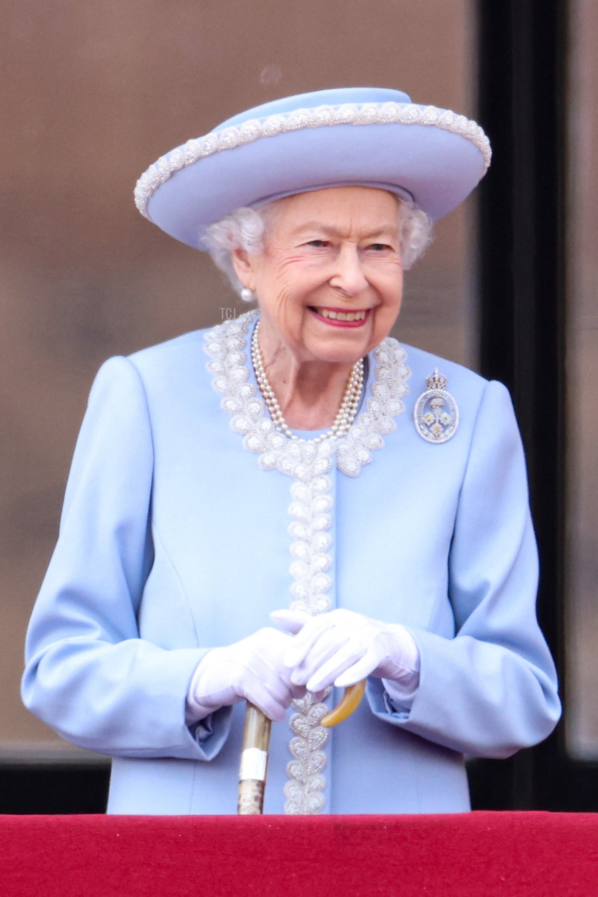 Britain's Queen Elizabeth II stands on the Balcony of Buckingham Palace as the troops march past during the Queen's Birthday Parade, the Trooping the Colour, as part of Queen Elizabeth II's platinum jubilee celebrations, in London on June 2, 2022