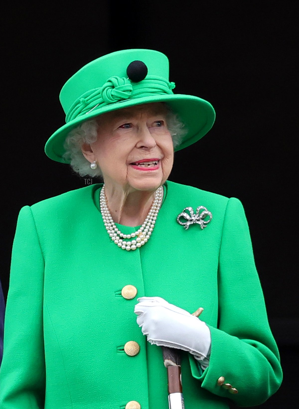 Queen Elizabeth II waves from the balcony of Buckingham Palace during the Platinum Jubilee Pageant on June 05, 2022 in London, England