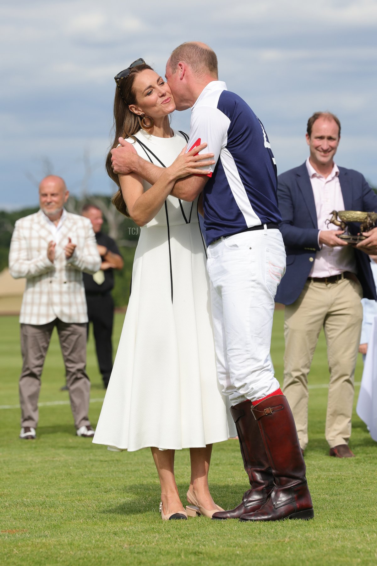 Prince William, Duke of Cambridge and Catherine, Duchess of Cambridge embrace after the Royal Charity Polo Cup 2022 at Guards Polo Club during the Outsourcing Inc. Royal Polo Cup at Guards Polo Club, Flemish Farm on July 06, 2022 in Windsor, England