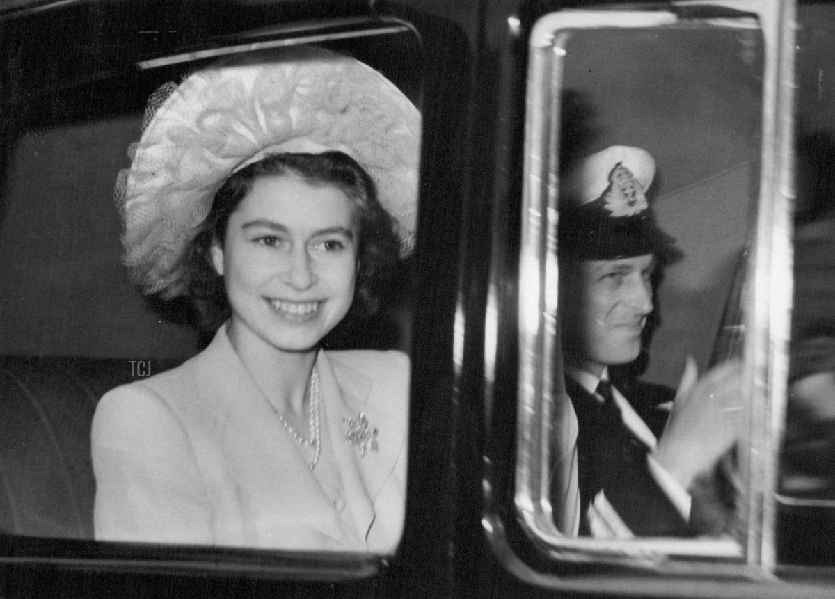Bethrothed And Smiling Princess and Philip Leave the Palace -- Princess Elizabeth and Lieutenant Philip Mountbatten leave Buckingham Palace by car