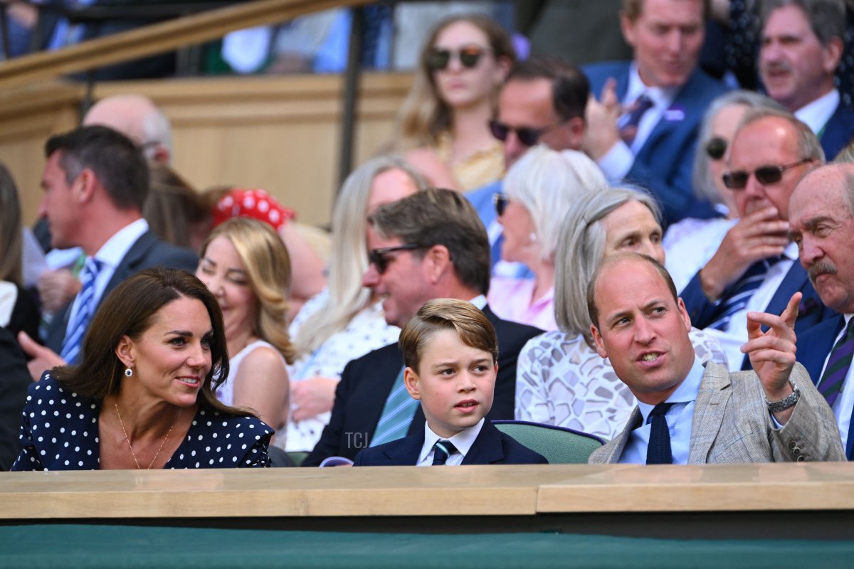 Britain's Catherine, Duchess of Cambridge (L) and Britain's Prince William, Duke of Cambridge look at their son Prince George (C) as they attend the men's singles final tennis match between Serbia's Novak Djokovic and Australia's Nick Kyrgios on the fourteenth day of the 2022 Wimbledon Championships at The All England Tennis Club in Wimbledon, southwest London, on July 10, 2022