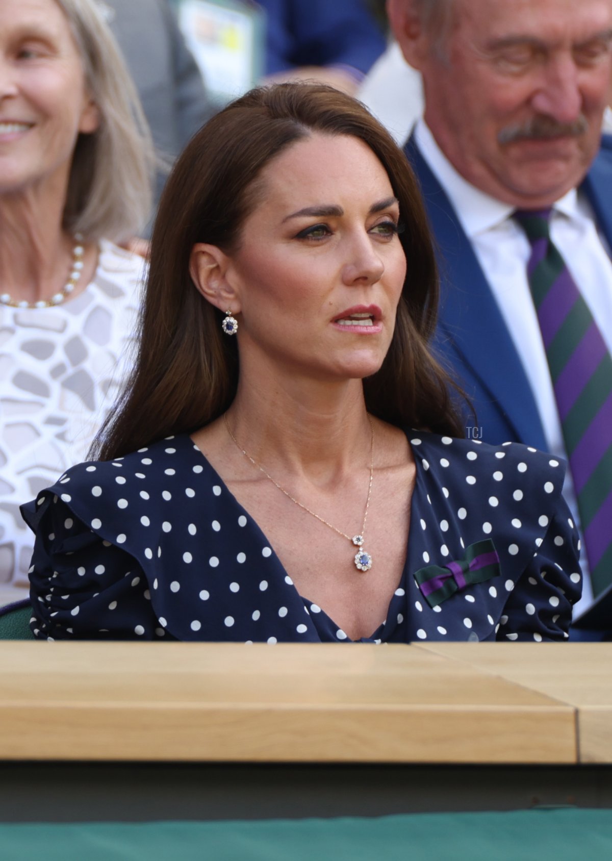 Ian Hewitt, The AELTC Chairman (L) and Catherine, Duchess of Cambridge are seen in the Royal Box watching Novak Djokovic of Serbia play Nick Kyrgios of Australia during their Men's Singles Final match on day fourteen of The Championships Wimbledon 2022 at All England Lawn Tennis and Croquet Club on July 10, 2022 in London, England