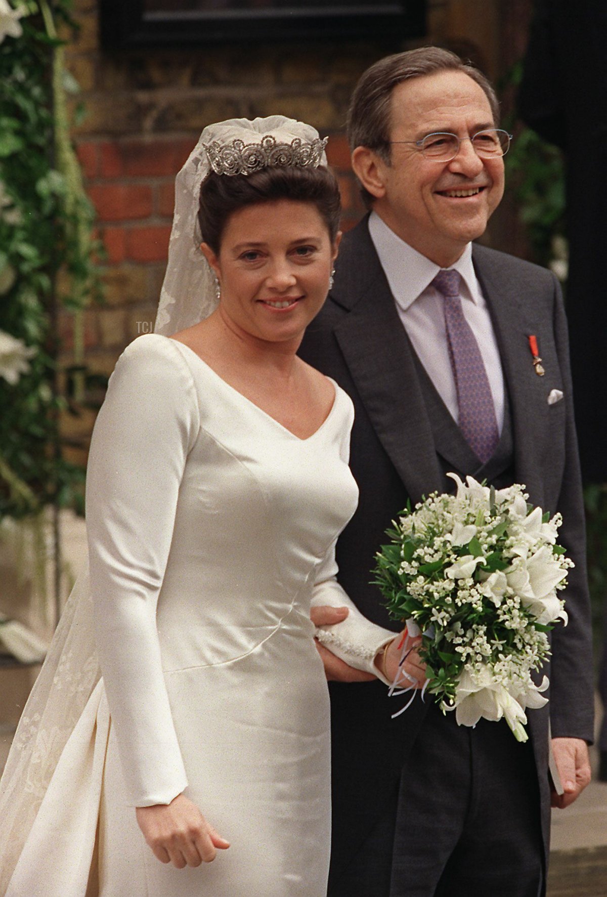 Princess Alexia and her father, the exiled King Constantine of Greece, smile on their arrival to the Greek Orthodox Cathedral of St. Sophia, Central London, 9th July 1999, for the Princess's wedding to Carlos Morales Quintana of Spain