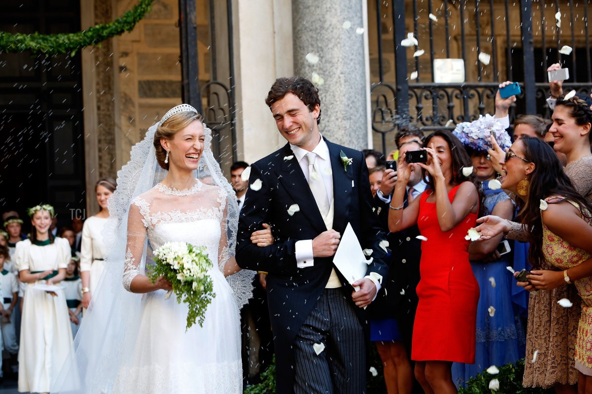 Prince Amedeo of Belgium and Princess Elisabetta Maria Rosboch von Wolkenstein celebrate after their wedding ceremony at Basilica Santa Maria in Trastevere on July 5, 2014 in Rome, Italy