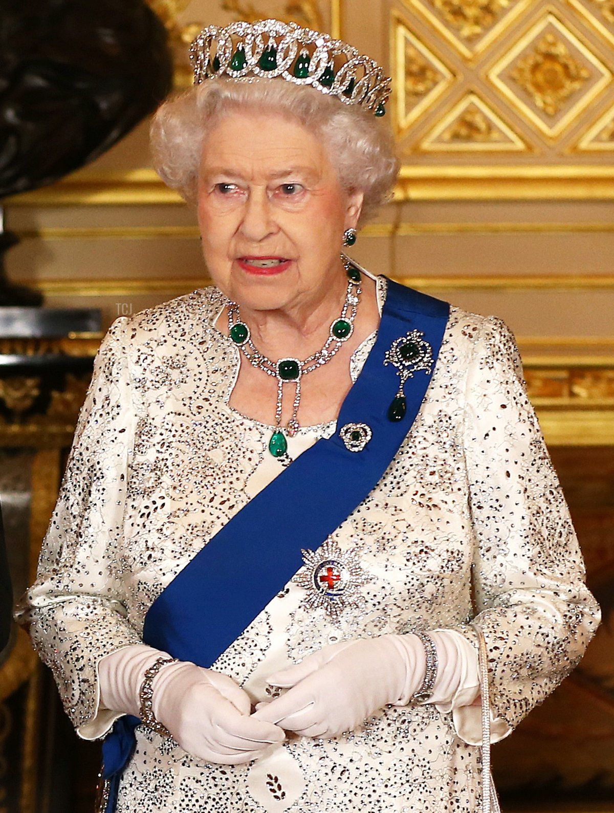 Irish President Michael D. Higgins (L) and Britain's Queen Elizabeth II (R) pose for a photograph ahead of a State Banquet during the Irish president's state visit in Windsor, west of London, on April 8, 2014