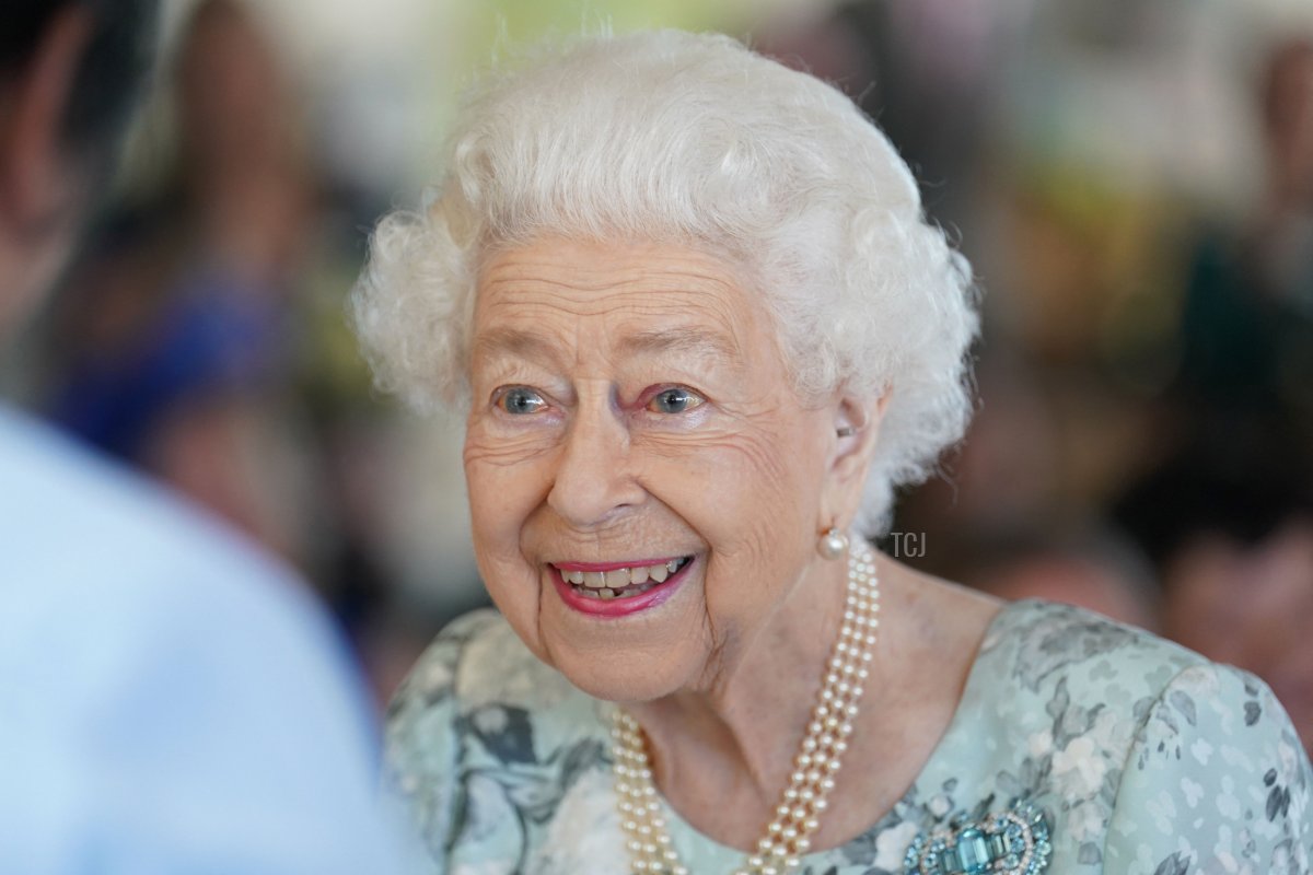 Britain's Queen Elizabeth II smiles during a visit to officially open the new building of Thames Hospice in Maidenhead, Berkshire, on July 15, 2022