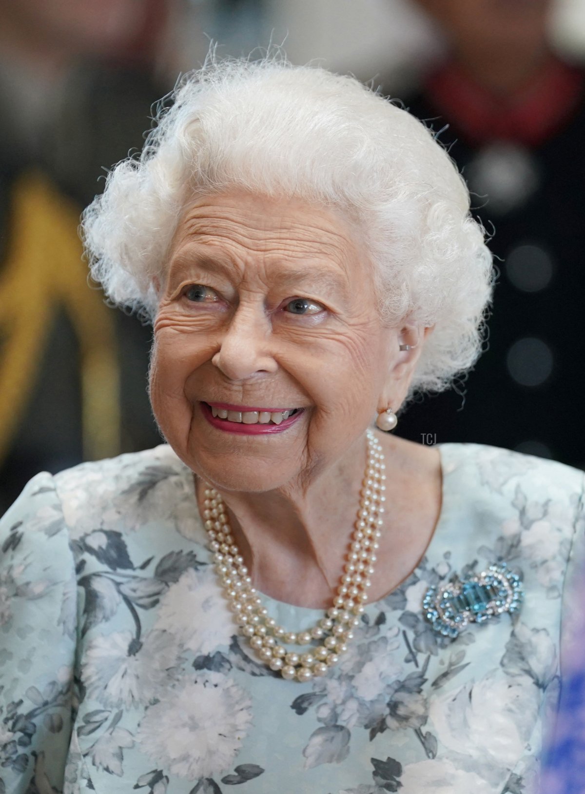 Britain's Queen Elizabeth II smiles during a visit to officially open the new building of Thames Hospice in Maidenhead, Berkshire, on July 15, 2022