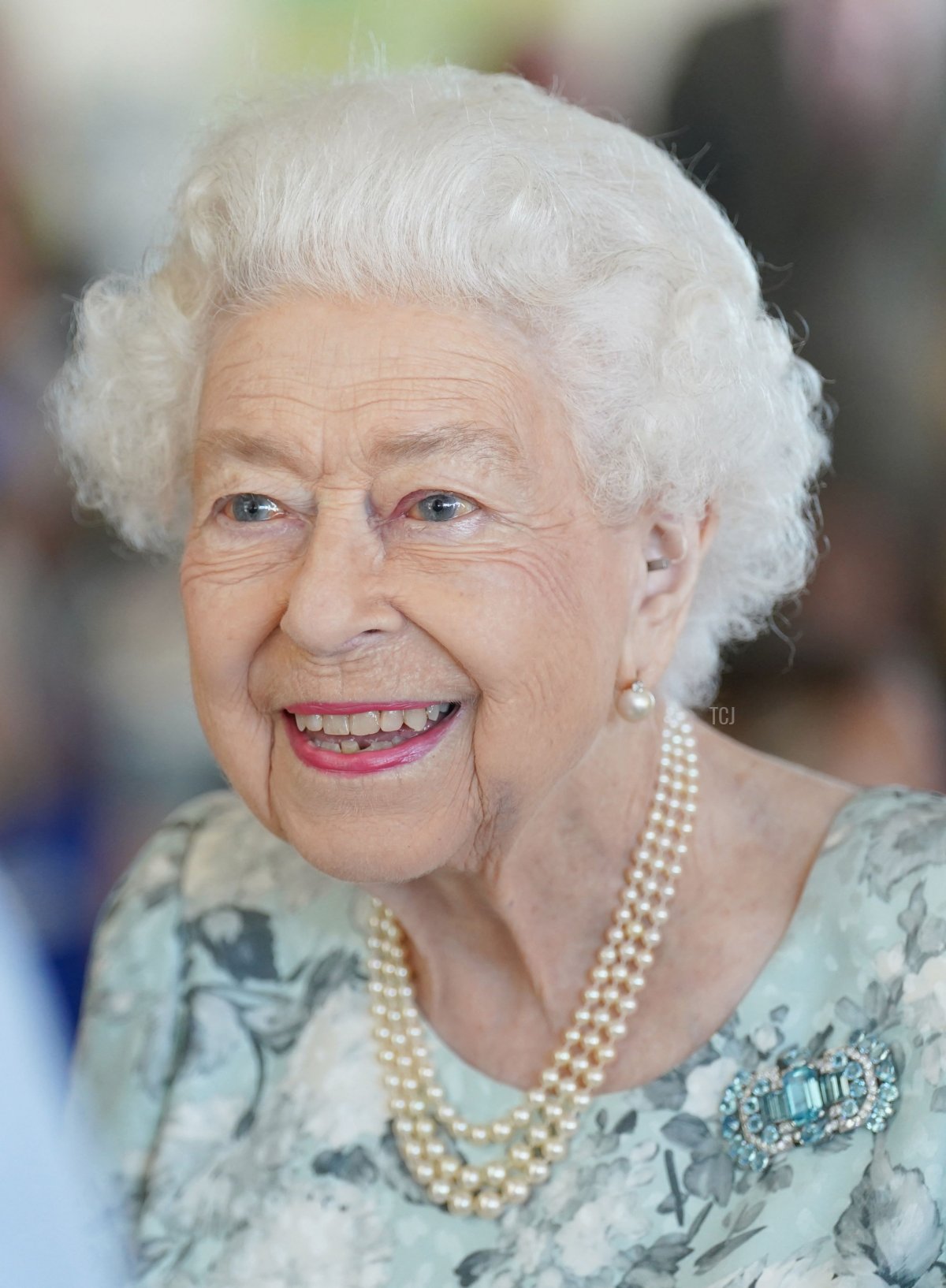 Britain's Queen Elizabeth II smiles during a visit to officially open the new building of Thames Hospice in Maidenhead, Berkshire, on July 15, 2022