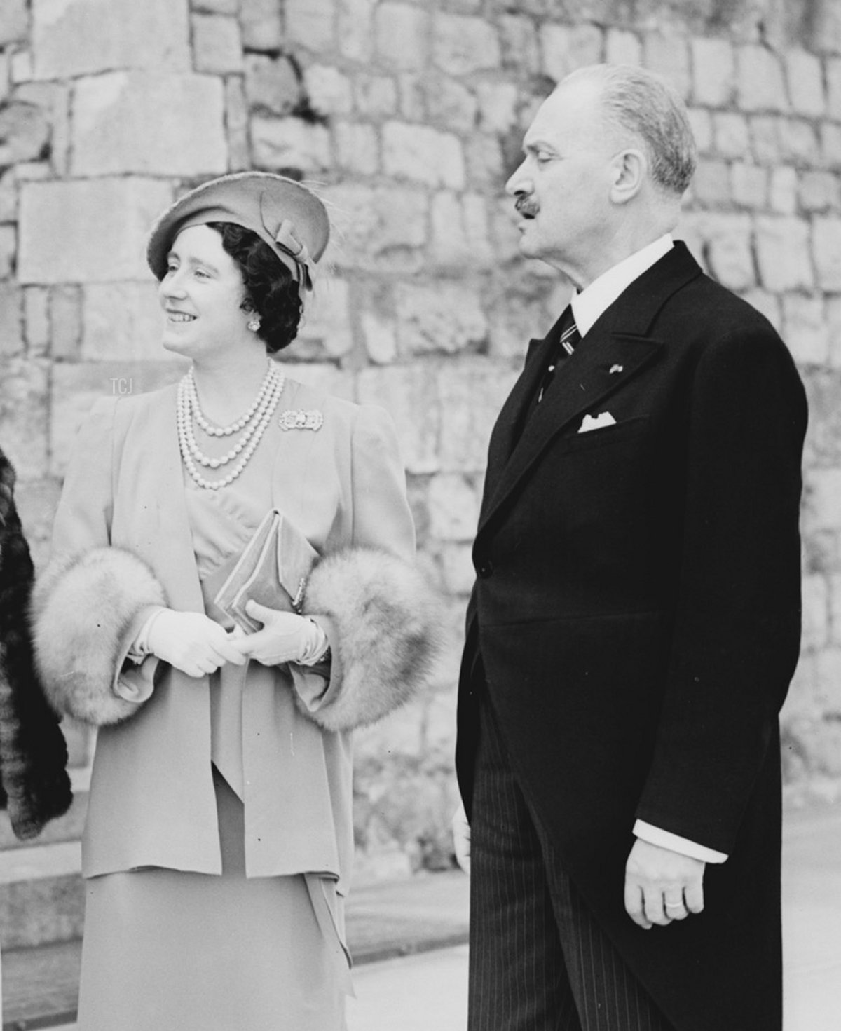 The Queen Elizabeth (2nd-R, future Queen Mother) and her husband the King George VI (L) meet 23 March 1939 with French President Lebrun (R) and his wife (2nd-L) at Windsor Castle