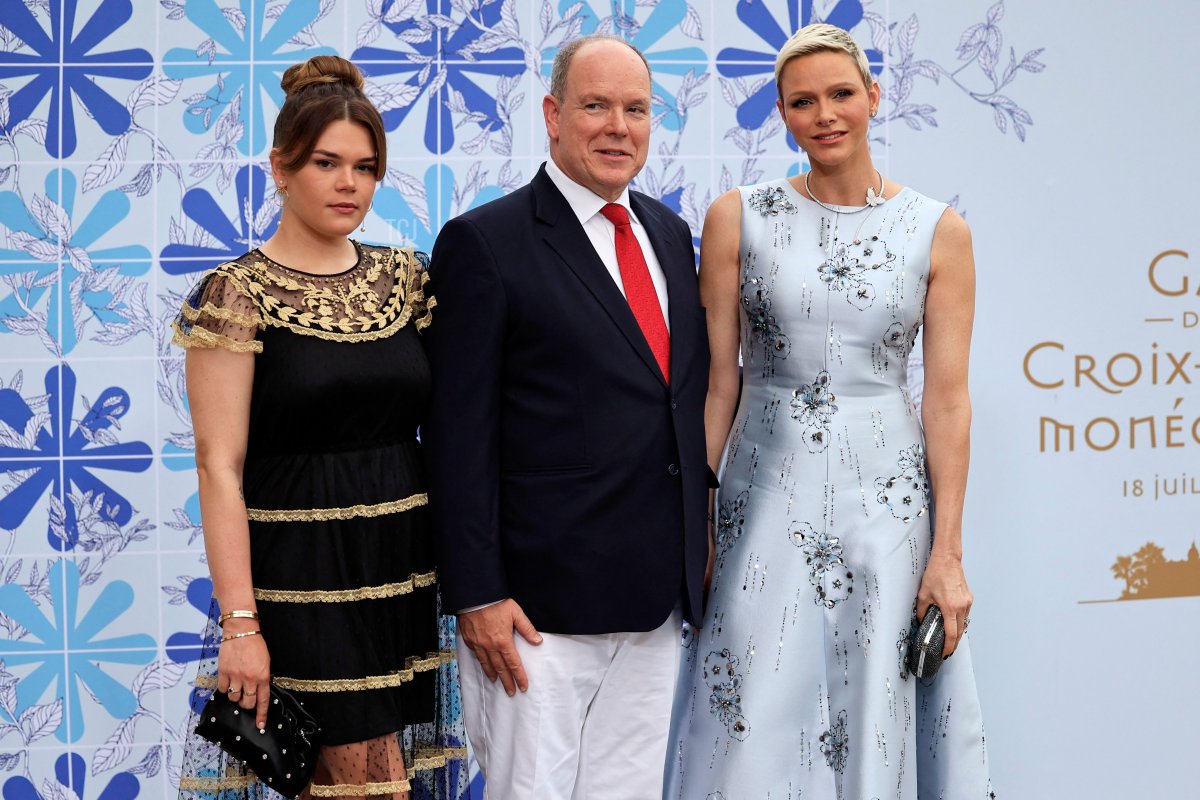 Prince Albert II of Monaco and Princess Charlene of Monaco and Princess Stephanie of Monaco's daughter Camille Gottlieb (L) pose upon their arrival for the 73rd edition of the Red Cross Gala at the Casino in Monte Carlo on July 18, 2022