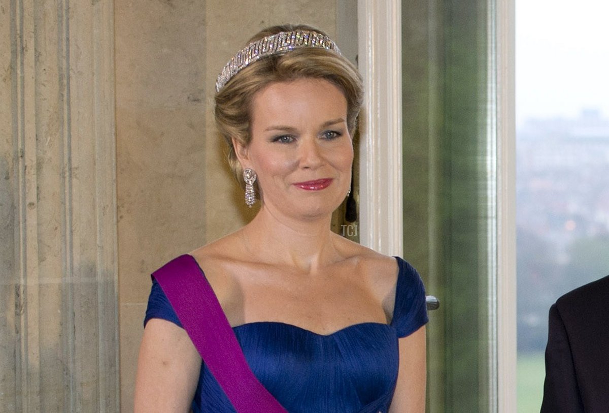 Queen Mathilde of Belgium, Chinese President Xi Jinping, King Philippe of Belgium and Chinese First Lady Peng Liyuan pose for a family photo before attending a state dinner at the Royal Castle in Laken-Laeken, Brussels, on March 31, 2014