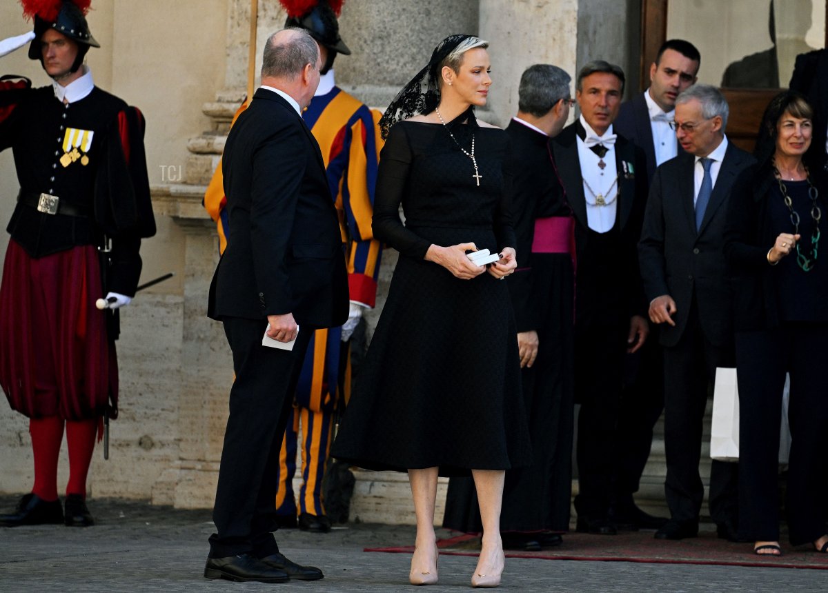 Monaco's Prince Alberto II and his wife Princess Charlene leave following a private audience with Pope Francis, at the Vatican, Vatican City on July 20, 2022