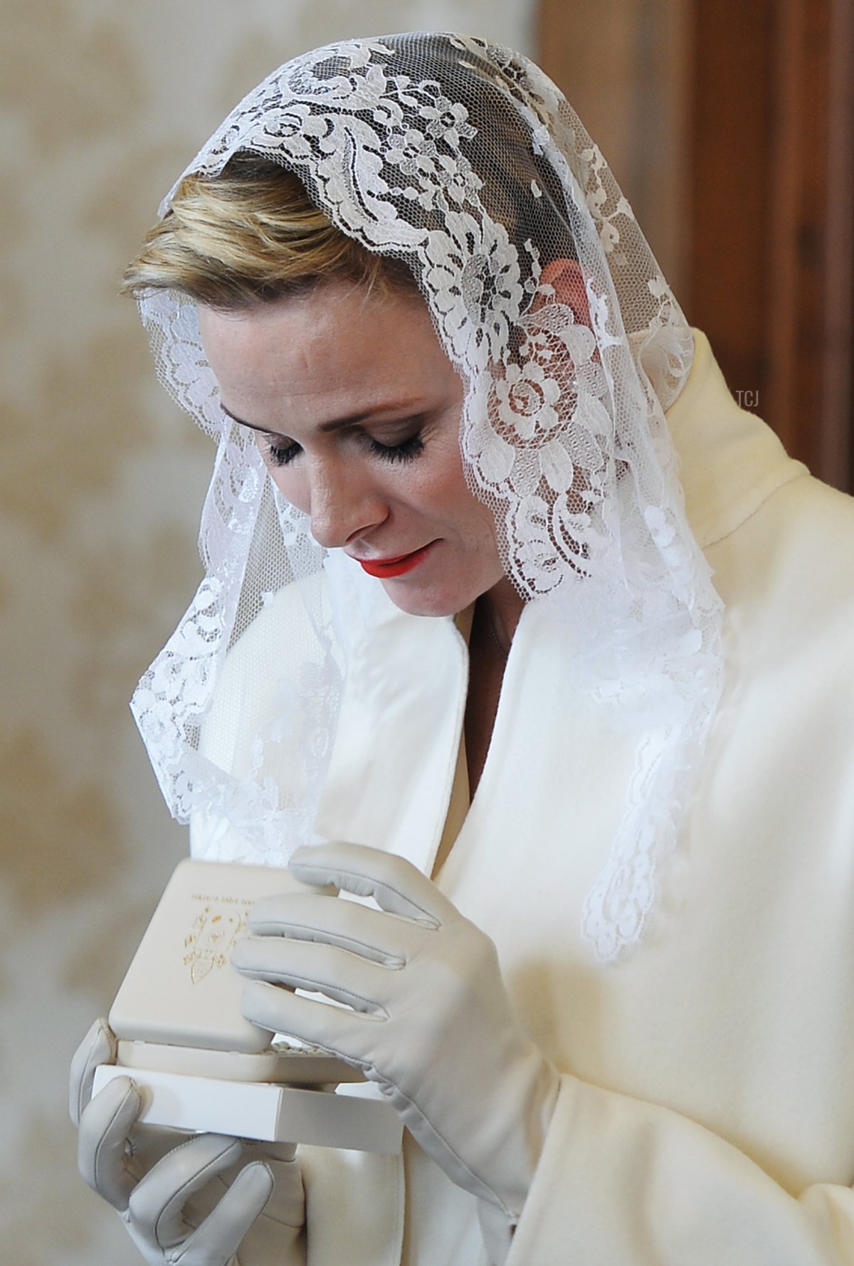 Princess Charlene of Monaco (L)looks on during a private audience with Pope Francis at the Vatican on January 18, 2016