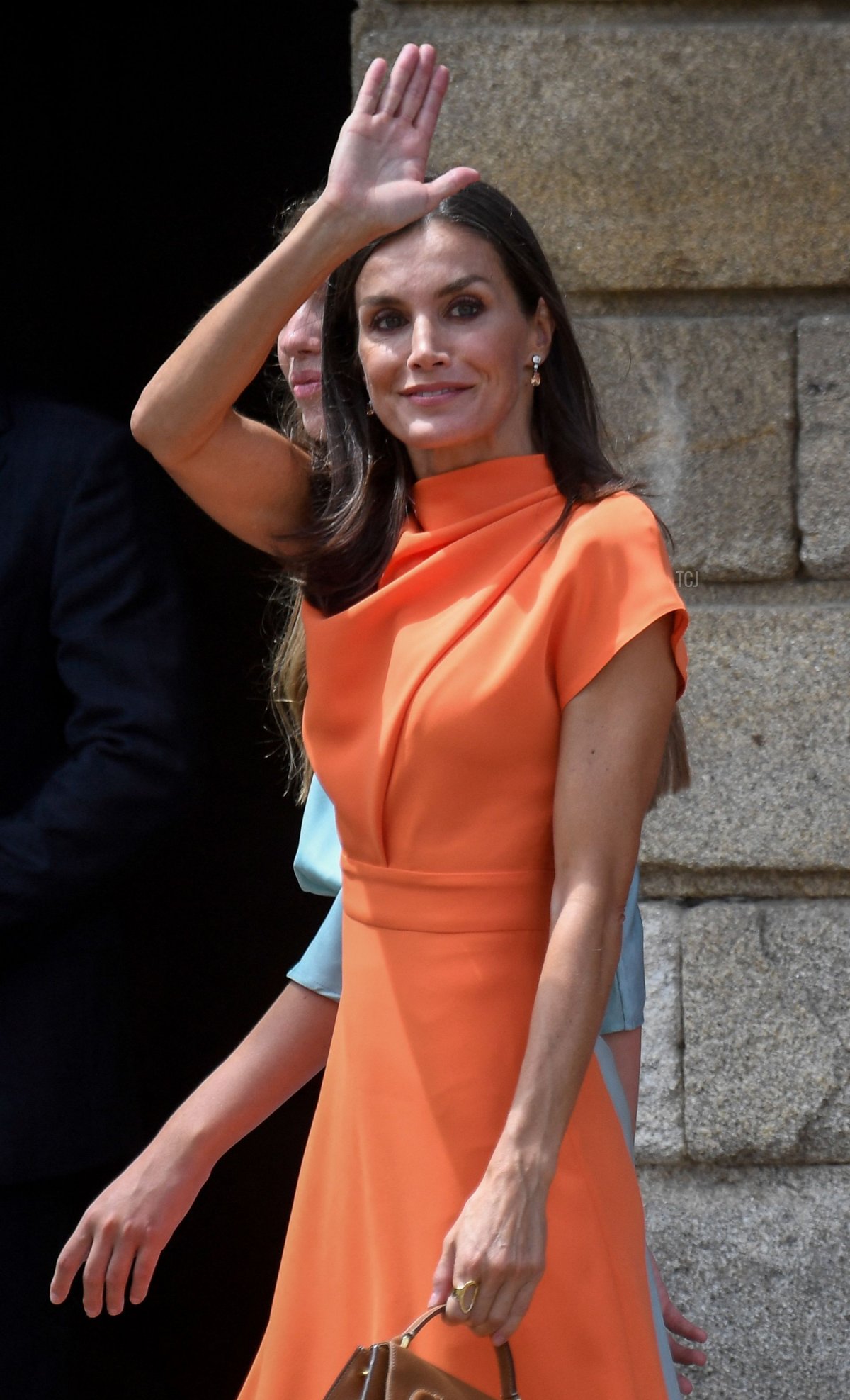 Spain's King Felipe VI and Spain's Queen Letizia arrive on Obradoiro Square after attending the "National Offering to the Apostle Santiago" at the Cathedral of Santiago de Compostela, on July 25, 2022