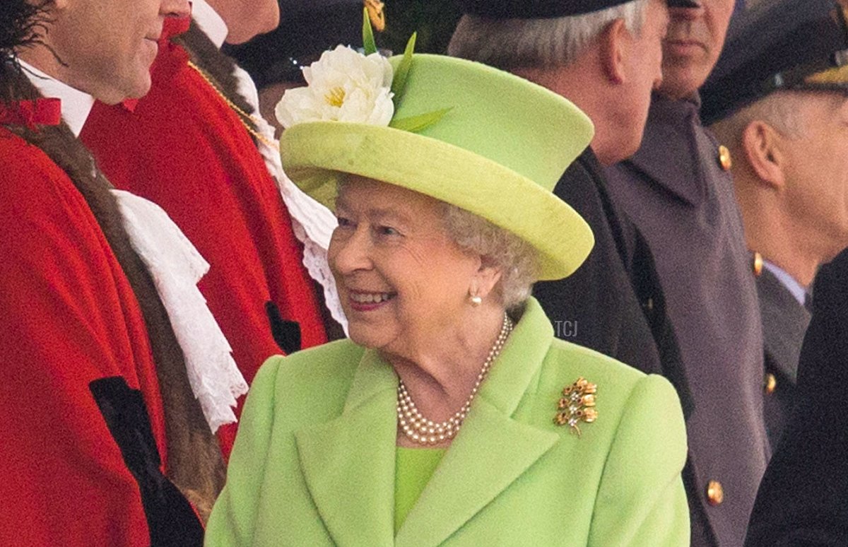 Queen Elizabeth II (C) and Prince Philip, Duke of Edinburgh (R) speak with Foreign Secretary Boris Johnson (2nd L) as they arrive at the royal pavilion for the Official Ceremonial Welcome for the Colombian State Visit at Horse Guards Parade on November 1, 2016 in London, England