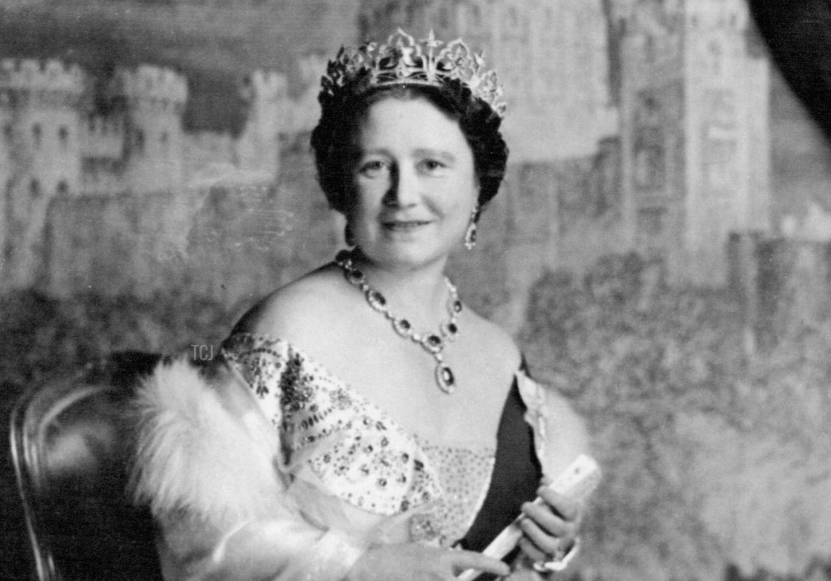 This New Photo of Queen Elizabeth The Queen Mother was made by Cecil Beaton in The music room of Buckingham Palace against a Backcloth showing Windsor Castle