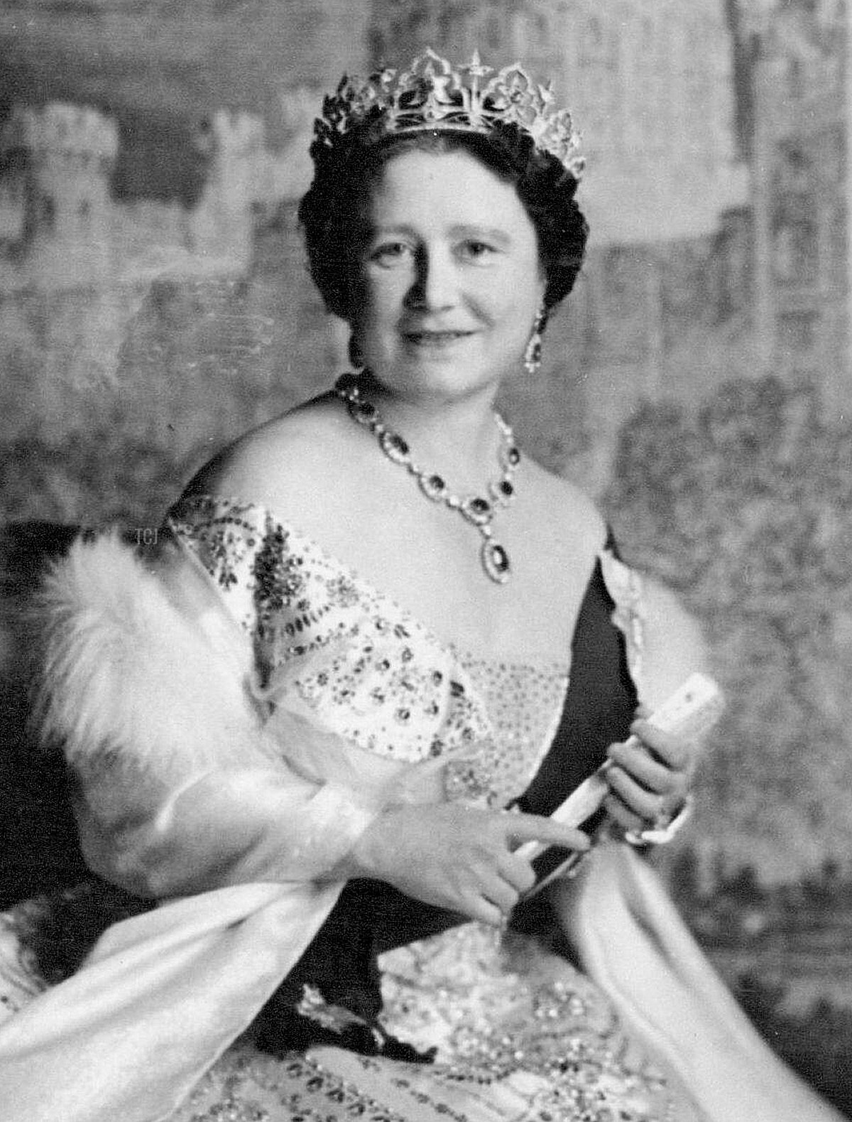 This New Photo of Queen Elizabeth The Queen Mother was made by Cecil Beaton in The music room of Buckingham Palace against a Backcloth showing Windsor Castle