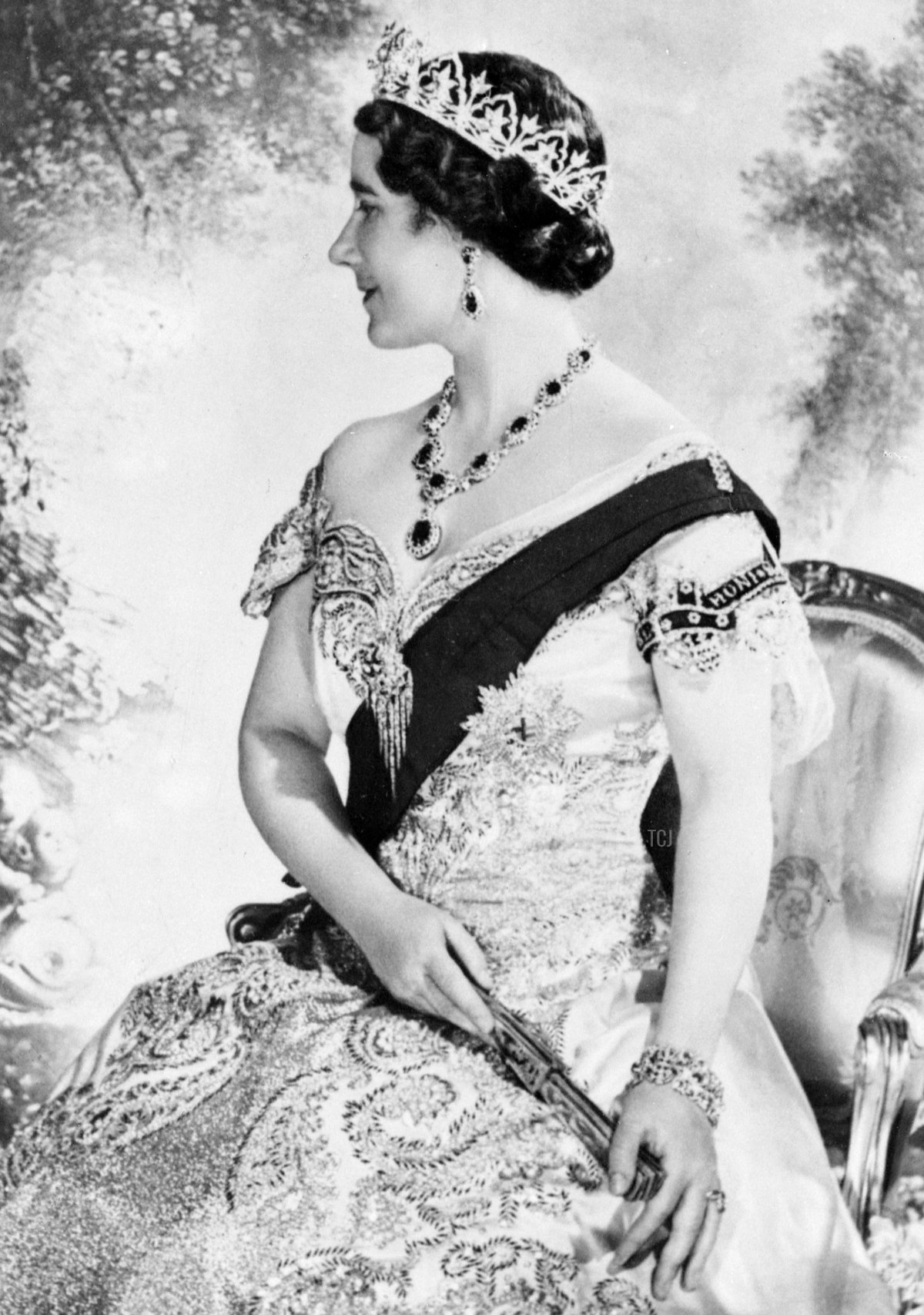 Queen Elizabeth, the former Duchess of York smiles as she poses in 1937 for official picture in London after the Coronation 12 May 1937 of the Duke of York
