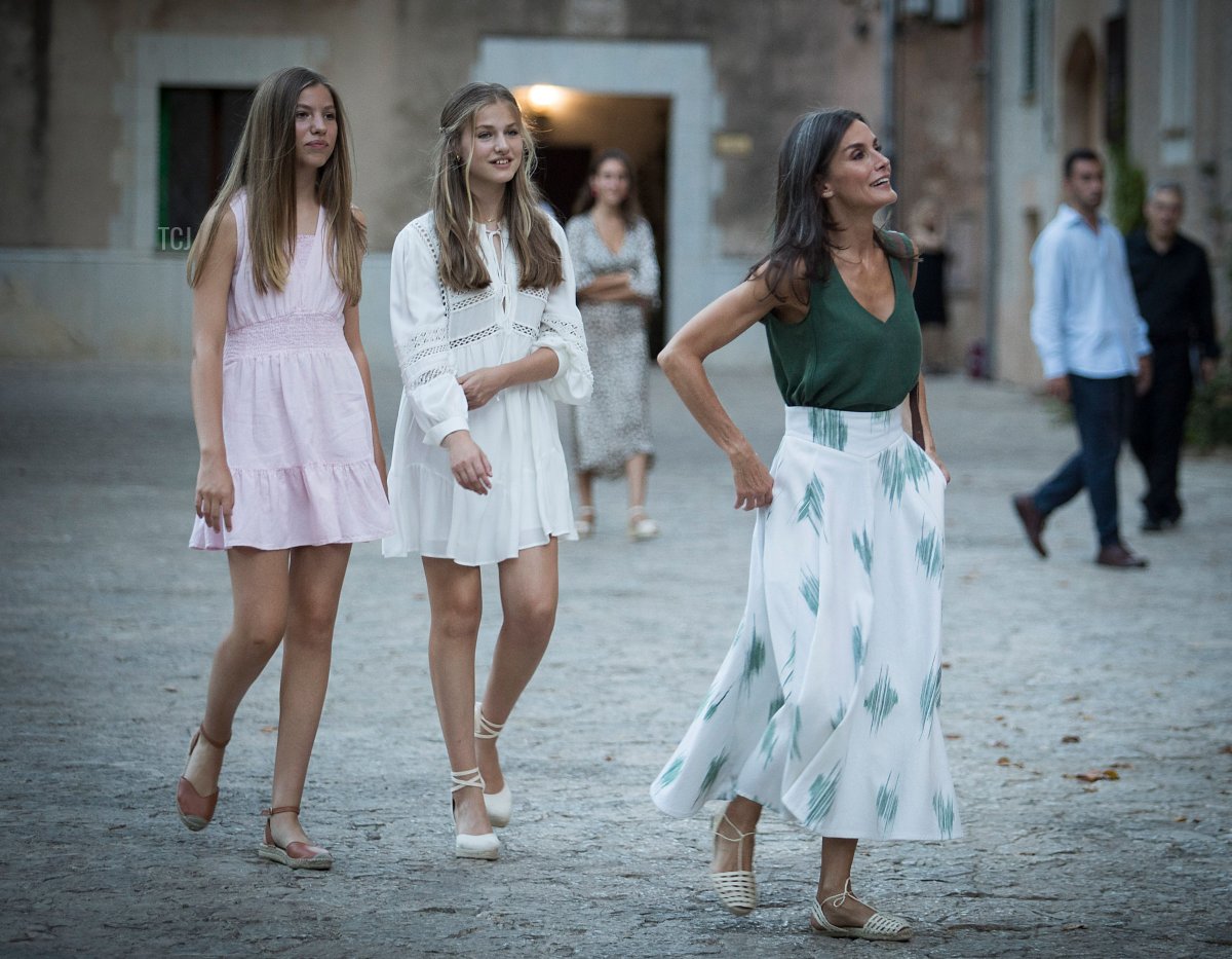 Spanish Princess Sofia, Spanish Crown Princess of Asturias Leonor and Spain's Queen Letizia look on during a visit of the Cartoixa of Valldemossa on the island of Mallorca during their summer holidays in the Balearic islands on August 1, 2022