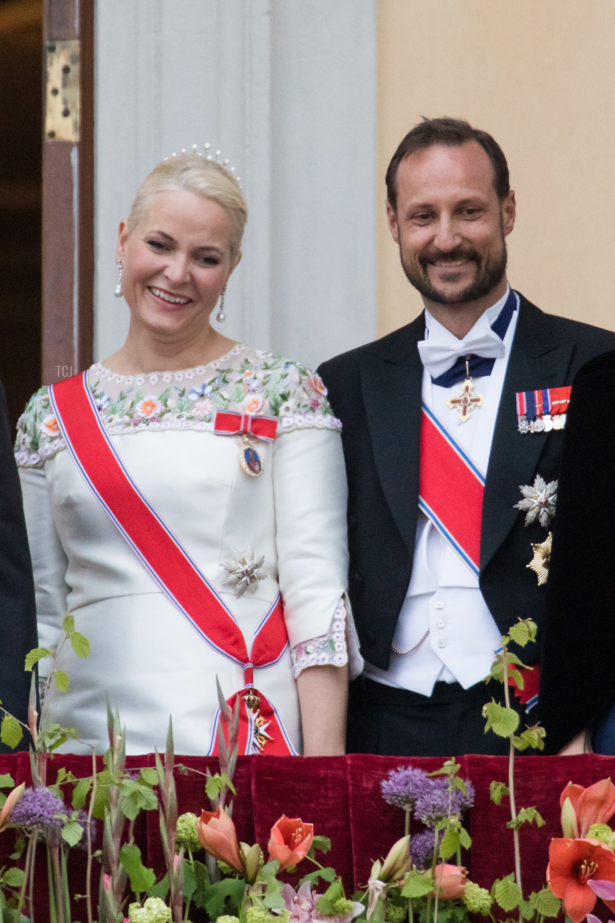 Crown Princess Mette Marit and Crown Prince Haakon of Norway greet wellwishers from the balcony of the Royal Palace in Oslo, Norway on May 9, 2017 to mark the 80th Birthday of the King and Queen