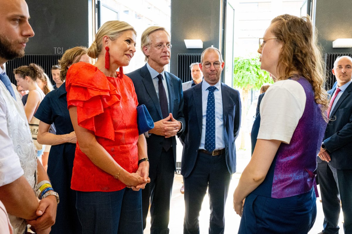 Queen Maxima of Netherlands (2ndL) and Dutch Minister of Education, Culture and Science Robbert Dijkgraaf visit the Welcome Week and Introductory Programme activity market for new students in Delft , on August 24, 2022