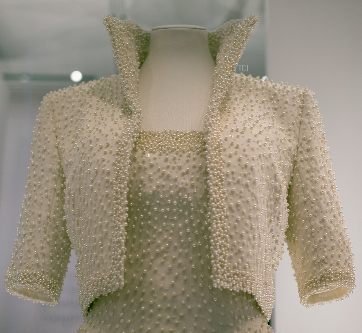 A 1989 Catherine Walker dress and jacket dress embroidered with sequins and pearls, known as the "Elvis Dress", worn by Princess Diana on an official visit to Hong Kong in 1989 on display at a press preview at Kensington Palace on February 22, 2017 in London, England