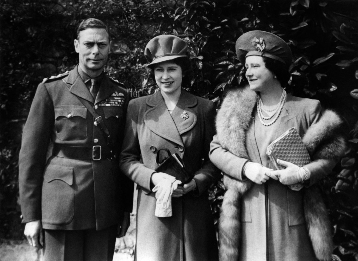 Queen Mother Elizabeth Bowes-Lyon (R) and King George VI, pose with their daughter Princess Elizabeth on April 21, 1944, as they celebrate her 18th birthday at Windsor Castle