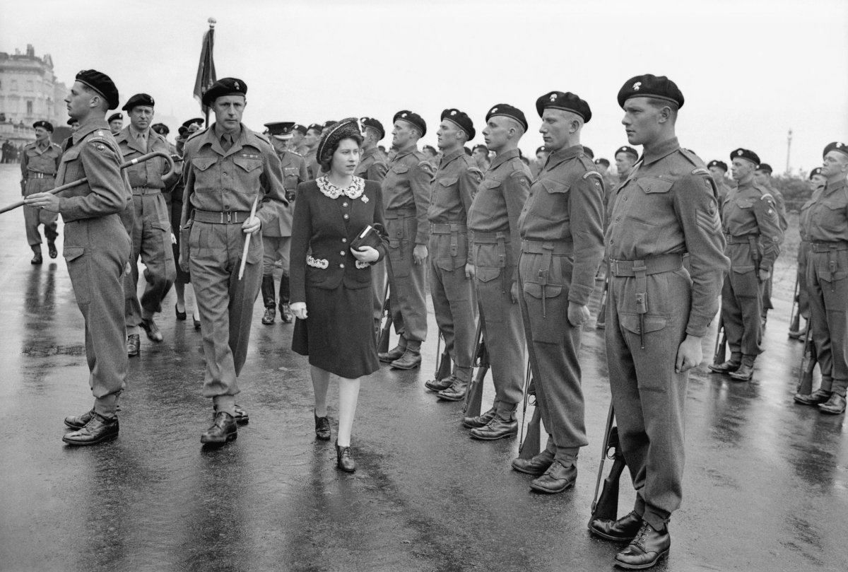 Princess Elizabeth inspecting an honour guard during a Royal visit to 2nd (Armoured) Battalion Grenadier Guards, 5th Guards Armoured Brigade, Guards Armoured Division, at Hove, 17 May 1944