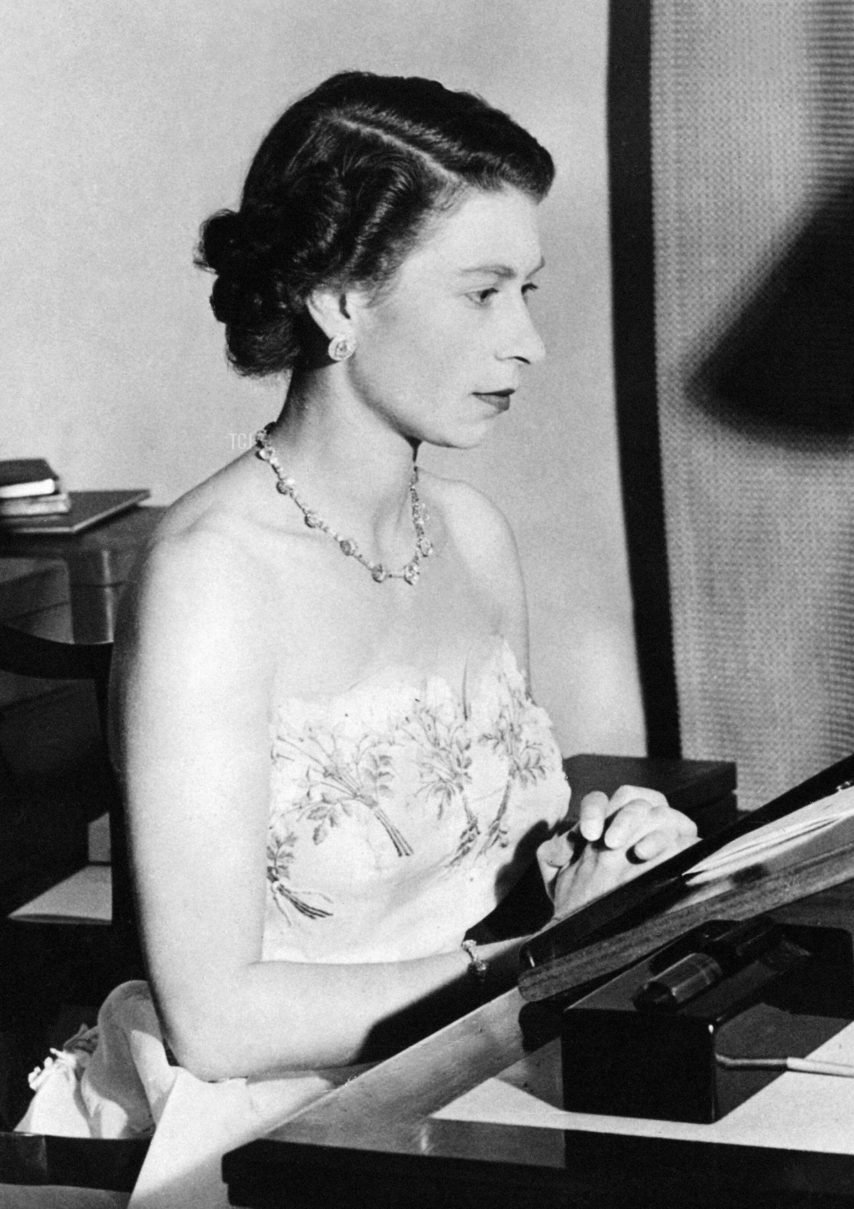 Queen Elizabeth II making her Christmas Day broadcast from Government House, Auckland, New Zealand. 25th December 1953
