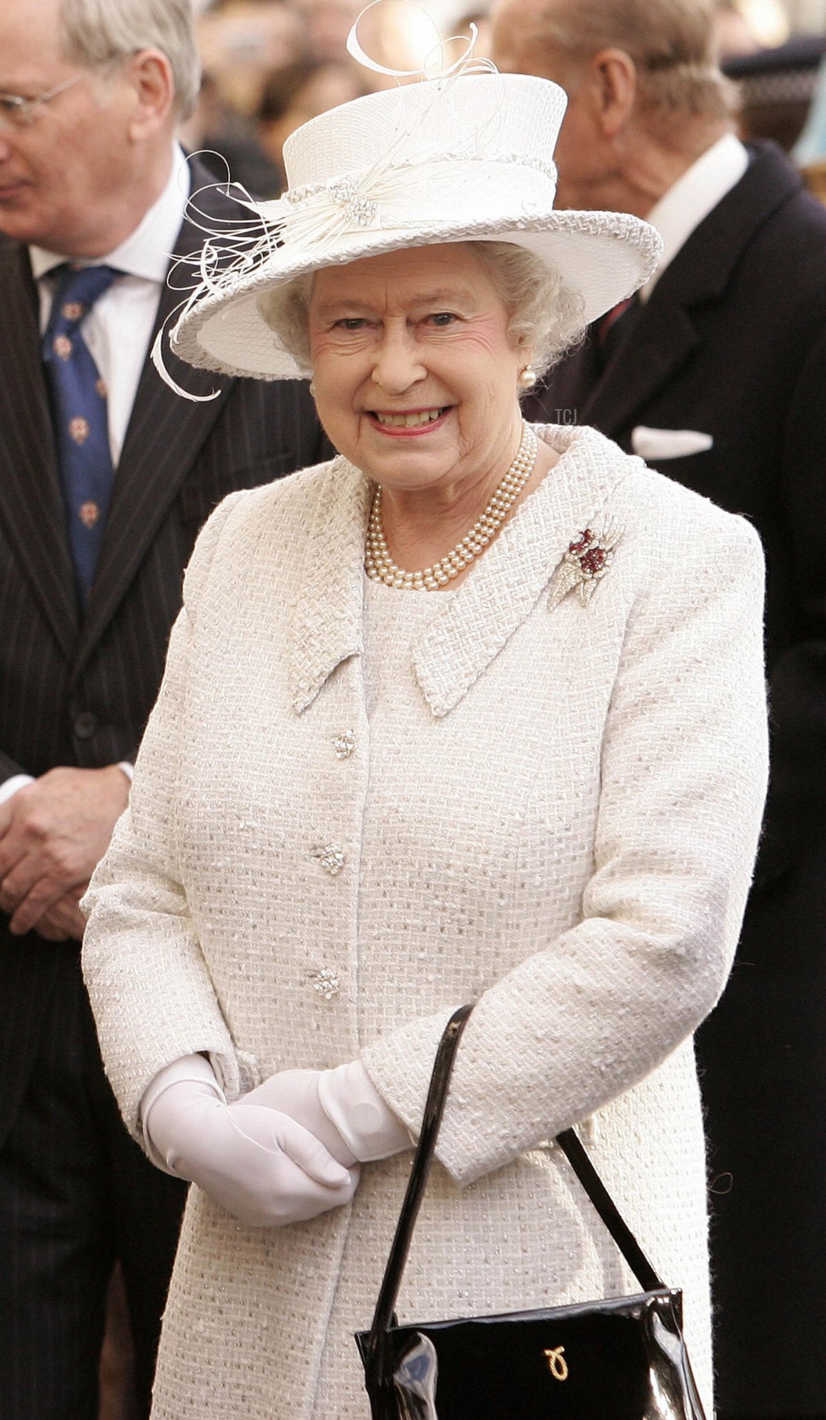 Britain's Queen Elizabeth II and Prince Philip (not seen) attend the unveiling of the Jubilee Walkway panel on Parliament Square in central London, 19 November 2007