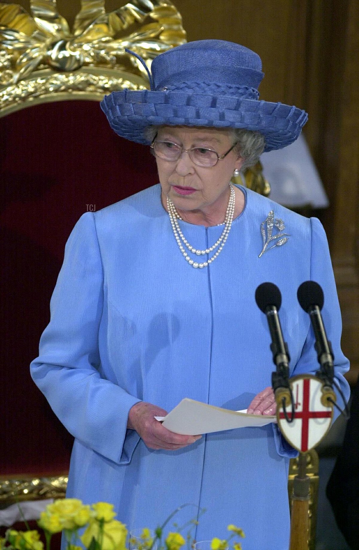 Britain's Queen Elizabeth II giving a speach at guildhall where she is having lunch in London 4 June 2002