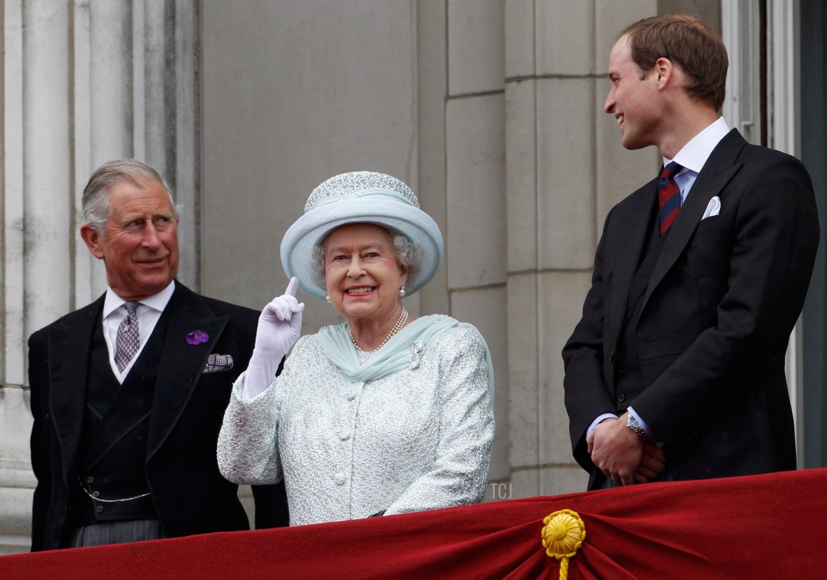Prince Charles, Prince of Wales, Queen Elizabeth II and Prince William, Duke of Cambridge on the balcony of Buckingham Palace during the finale of the Queen's Diamond Jubilee celebrations on June 5, 2012 in London, England