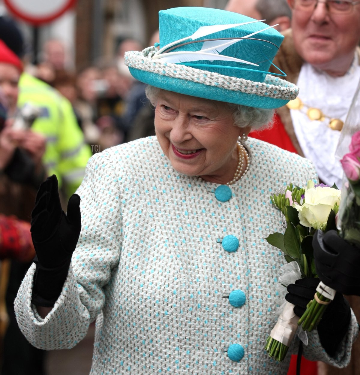 Queen Elizabeth II waves as she leaves Kings Lynn Town Hall on February 6, 2012 in Norfolk, England