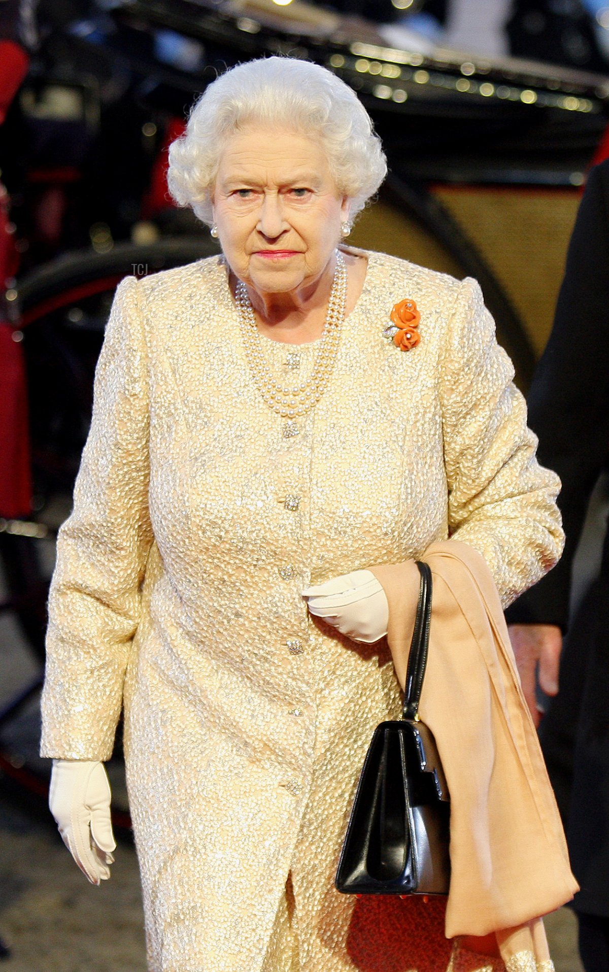 Queen Elizabeth II arrives at the Diamond Jubilee Pageant in the private grounds of Windsor Castle on May 13, 2012 in Windsor, England