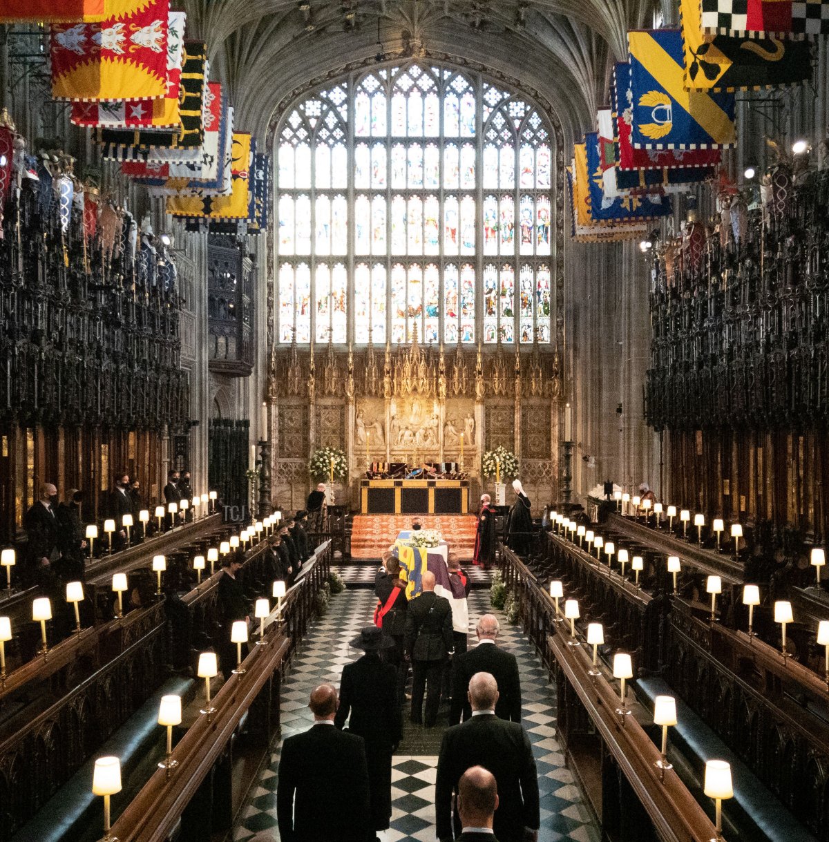 The coffin is carried into The Quire during the funeral service of Britain's Prince Philip, Duke of Edinburgh inside St George's Chapel in Windsor Castle in Windsor, west of London, on April 17, 2021