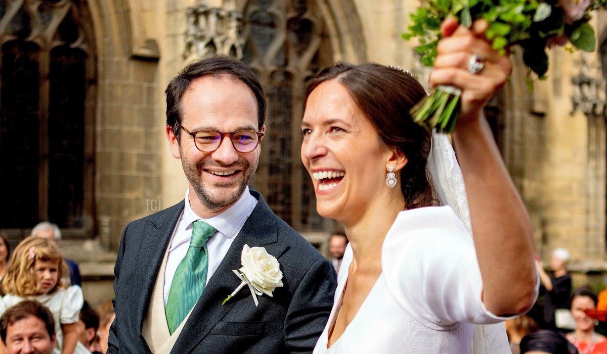 Count Charles Henri d'Udekem d'Acoz and Countess Caroline Philippe leave at the Eglise Saint-Michel in Pont-l Eveque, on September 03, 2022, after their wedding