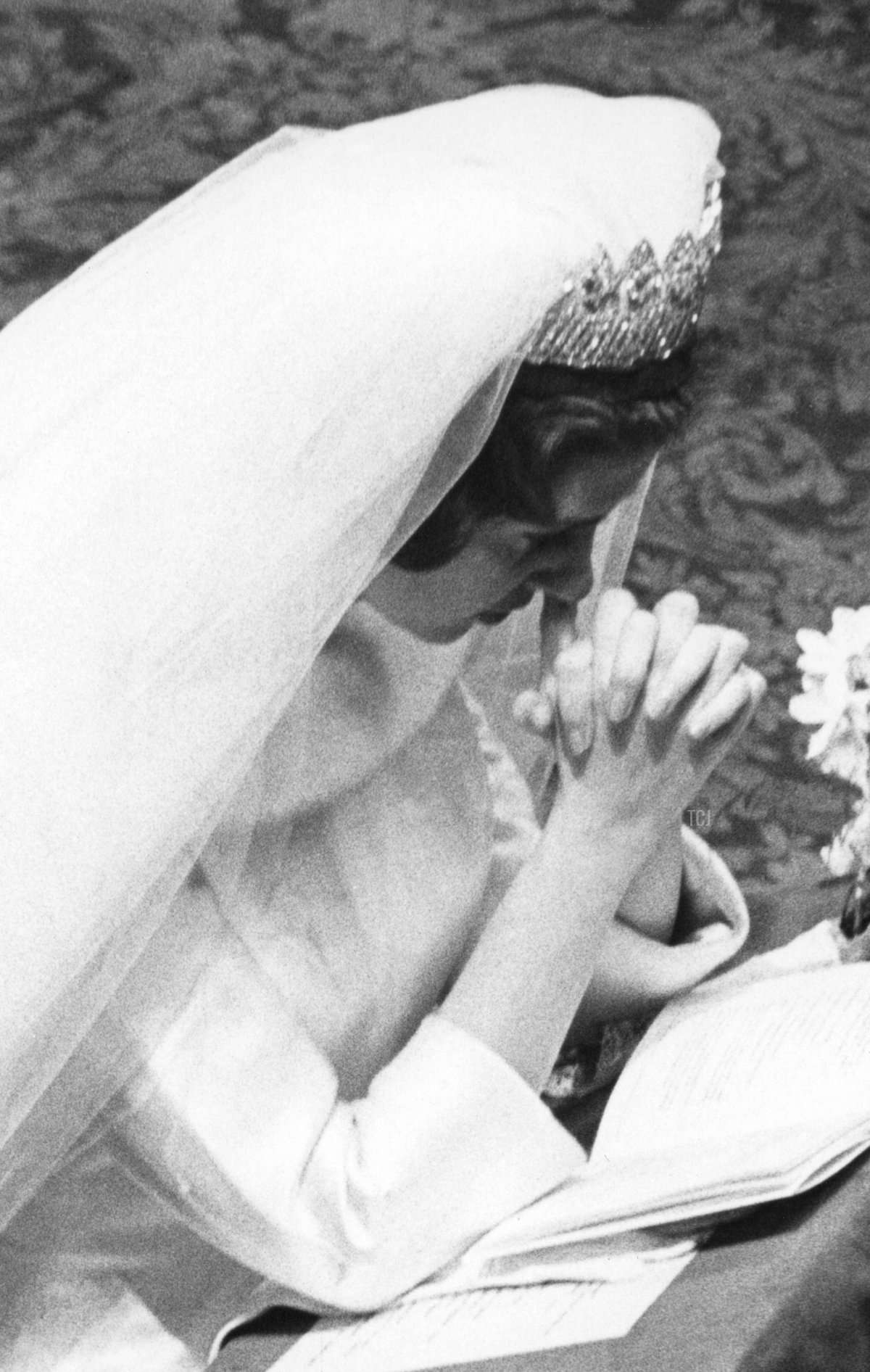 Picture taken on December 15, 1960 of Queen Fabiola praying and King Baudouin of belgium during their wedding ceremony at the Brussels Royal Palace