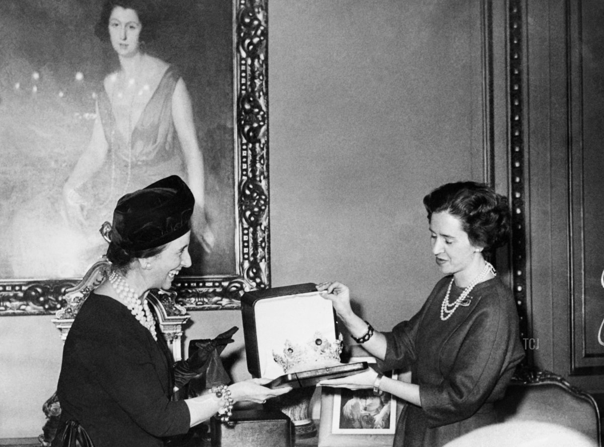Dona Fabiola de Mora y Aragon, fiancee and futur Queen Fabiola of Belgium (R) received a diadem as her wedding present, from Dona Carmen Polo de Franco (L), wife of Francisco Franco, on December 6, 1960