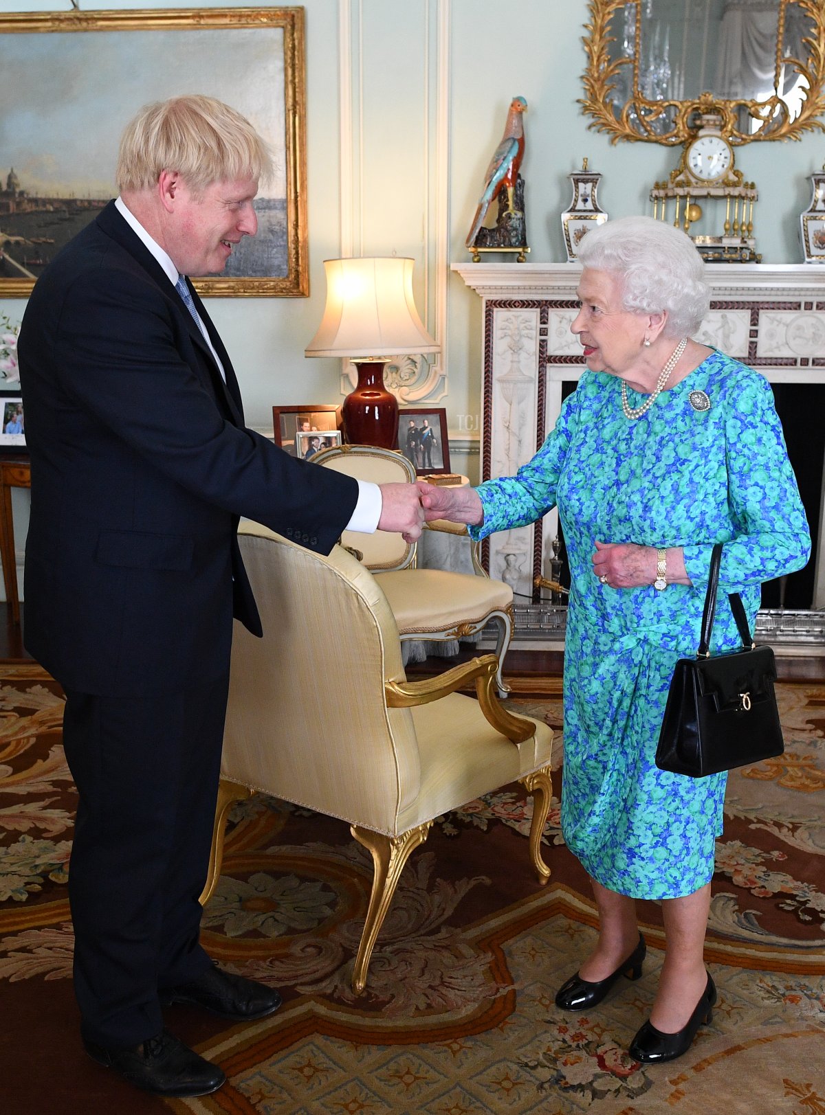 Queen Elizabeth II welcomes newly elected leader of the Conservative party, Boris Johnson during an audience where she invited him to become Prime Minister and form a new government in Buckingham Palace on July 24, 2019 in London, England